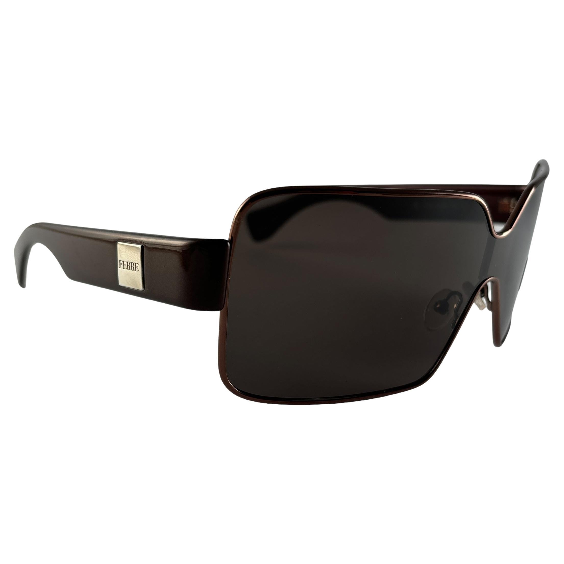 New Vintage Gianfranco Ferre Sunglasses

Wrap Around Mask With Copper Frame And Brown Mono Lens.
  
New, Never Worn Or Displayed
 
This Item May Show Minor Sign Of Wear Due To Storage

 Made In Italy



Front : 14.5 Cms
Lens Width : 14.5 Cms
Lens
