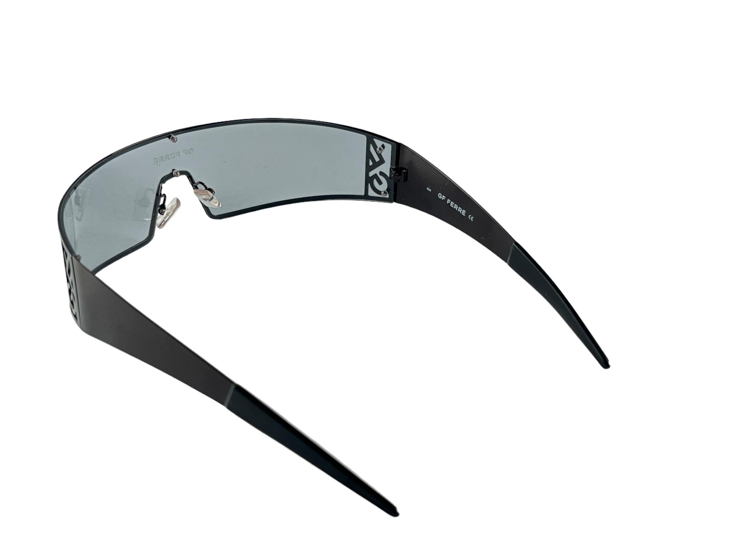 New Vintage Gianfranco Ferre Sunglasses

Black wrap around mask with light grey mono Lens.
  
New, Never Worn Or Displayed
 
This Item May Show Minor Sign Of Wear Due To Storage

 Made In Italy



