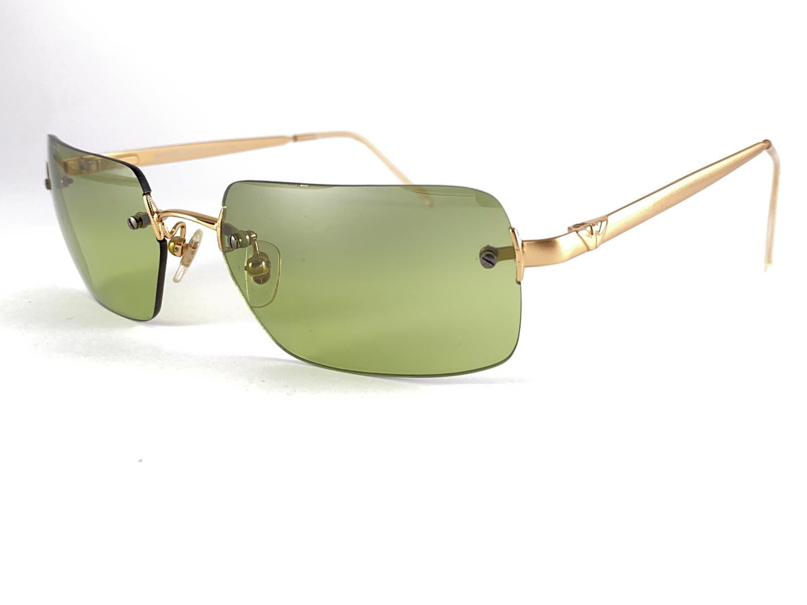 Neue Vintage Giorgio Armani 163 S randlose Gold 2000'S Sonnenbrille

Neu Vintage Giorgio Armani Rimless Gold Frame mit hellgrün  Linsen.

Hergestellt in Italien.
 
Produziert und gestaltet in den 2000er Jahren.

Neu, nie getragen oder