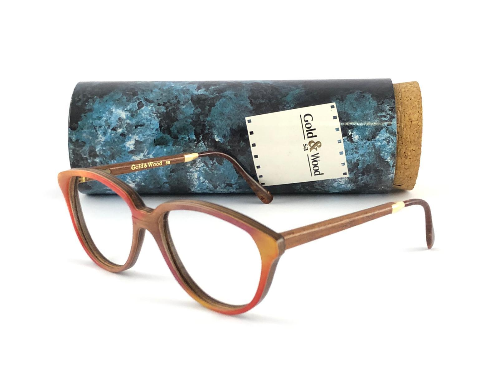 gold & wood eye glasses st. louis