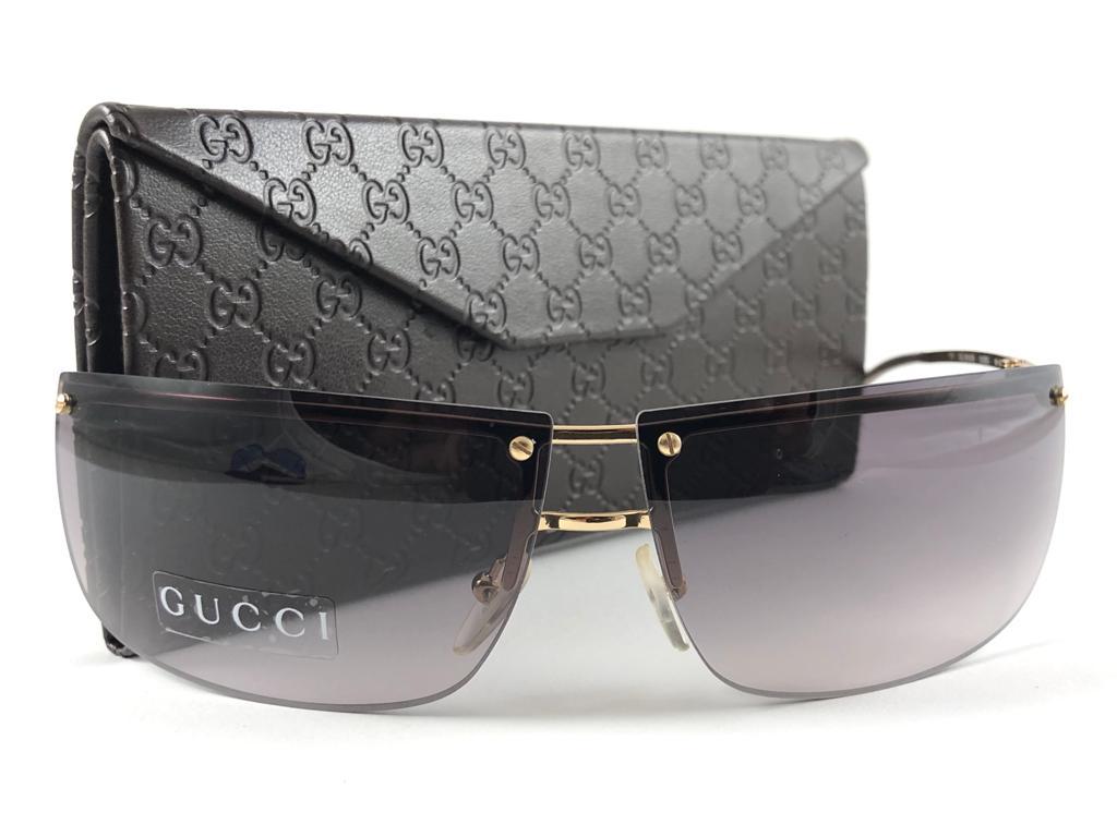 New Vintage Gucci Gold Half Frame with Gradient Amethyst Medium Lenses.
New never worn or displayed. 
This item could show minor sign of wear due to nearly 30 years of storage. Made in Italy.

Front                   13.5   cm
Lens Hight          