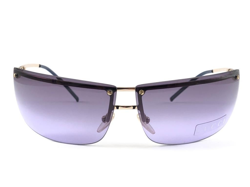 New Vintage Gucci Gold Half Frame with Gradient Purple Lenses.
New never worn or displayed. 
This item could show minor sign of wear due to nearly 30 years of storage. Made in Italy.

Front                   13.5   cm
Lens Hight           3.9  