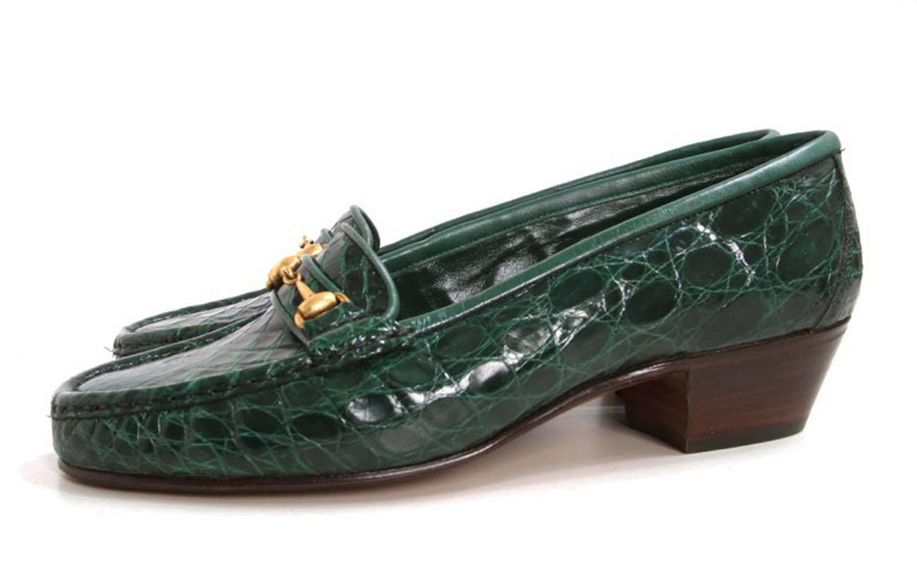 New Gucci Crocodile Women's Loafers
Designer size 36.5 B - US 6.5 B
Genuine crocodile skin, Gold-tone horsebit accent, Leather sole & insole.
Stacked heel - 1.25 inches
Made in Italy
New without box.
Unfortunately, due to restrictions, this loafers