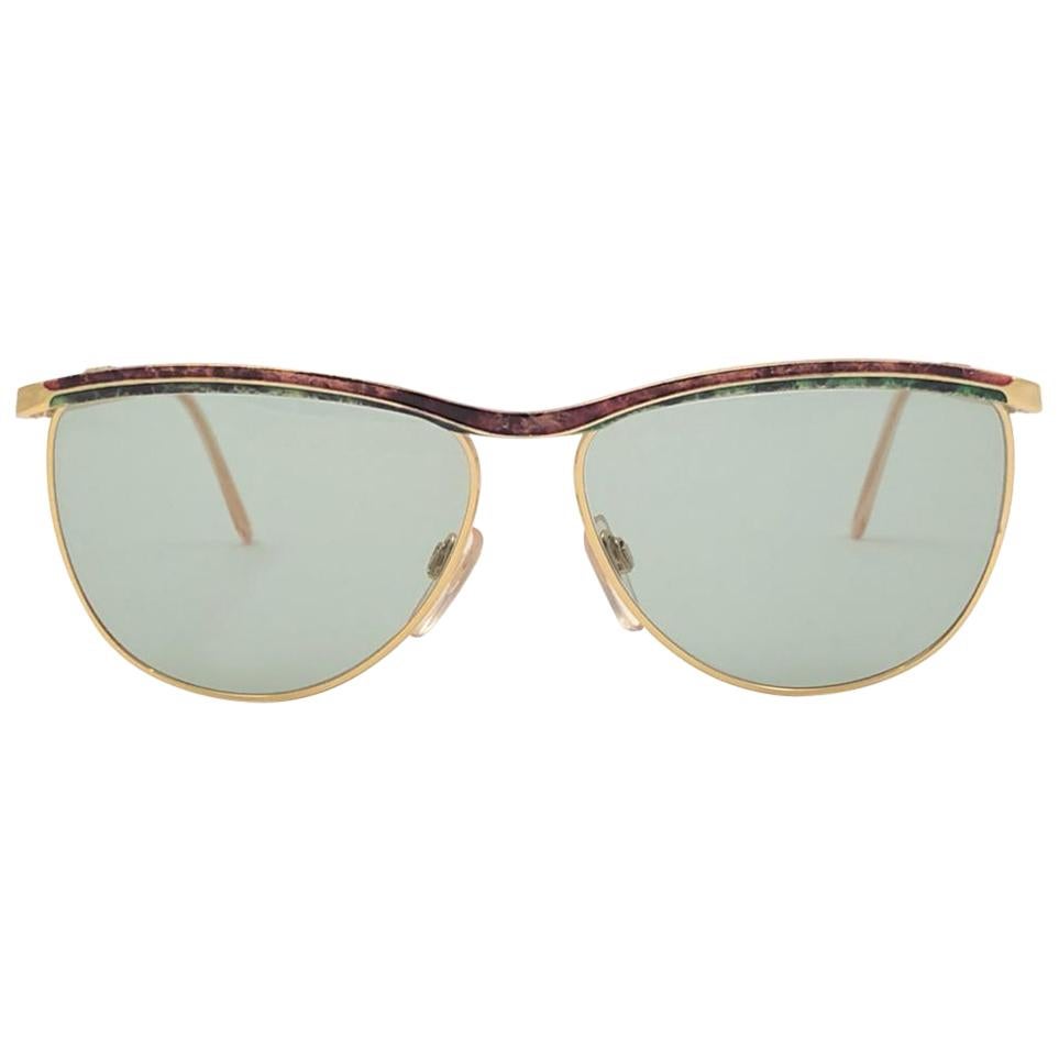 Nuevas gafas de sol vintage Gucci doradas y jaspeadas años 80 Made in Italy