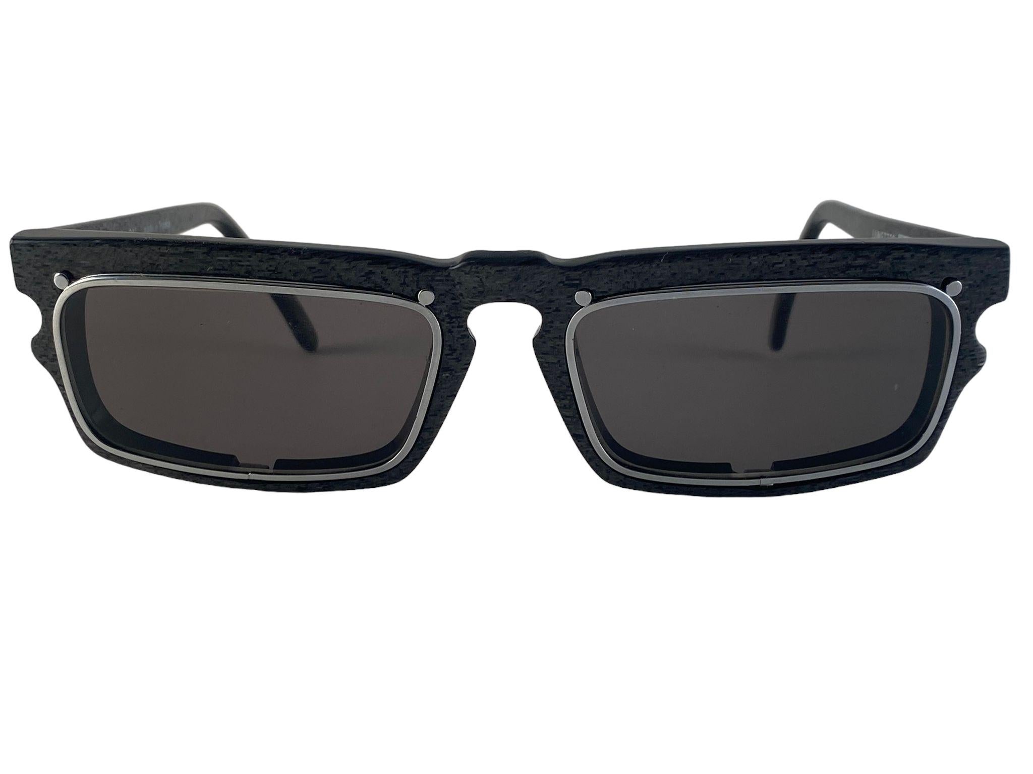 New vintage IDC 767, rectangular marbled grey frame with solid grey lenses.
The very same model worn by Anthony Kiedis from Red Hot Chili Peppers.
New, never worn or displayed this pair may have minor sign of wear due to storage.
Made in