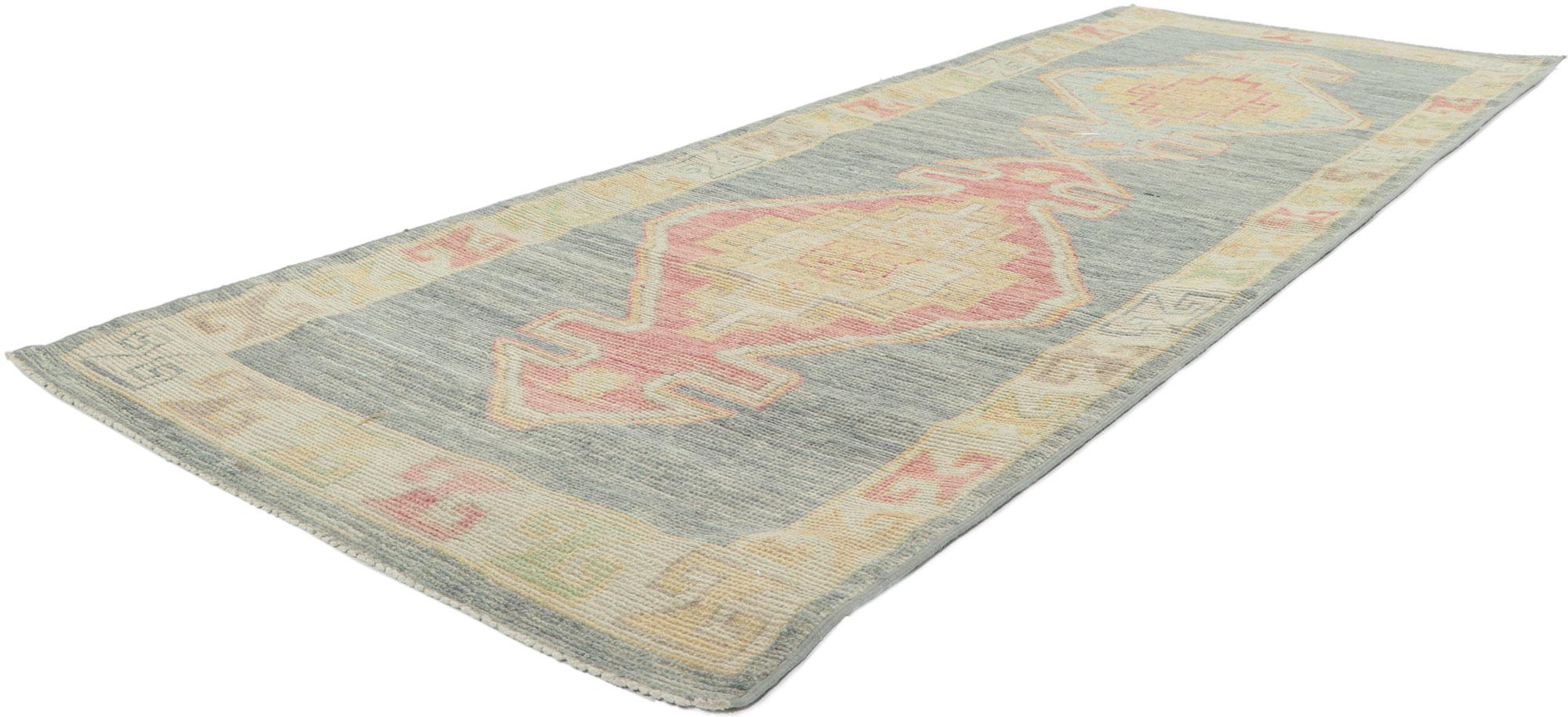 80855 Vintage-Inspired Oushak runner, 02'10 x 08'02. Polished and playful with a hint of nomadic charm, this hand-knotted wool vintage-inspired Oushak runner beautifully embodies a modern style. The abrashed field features two medallions decorated