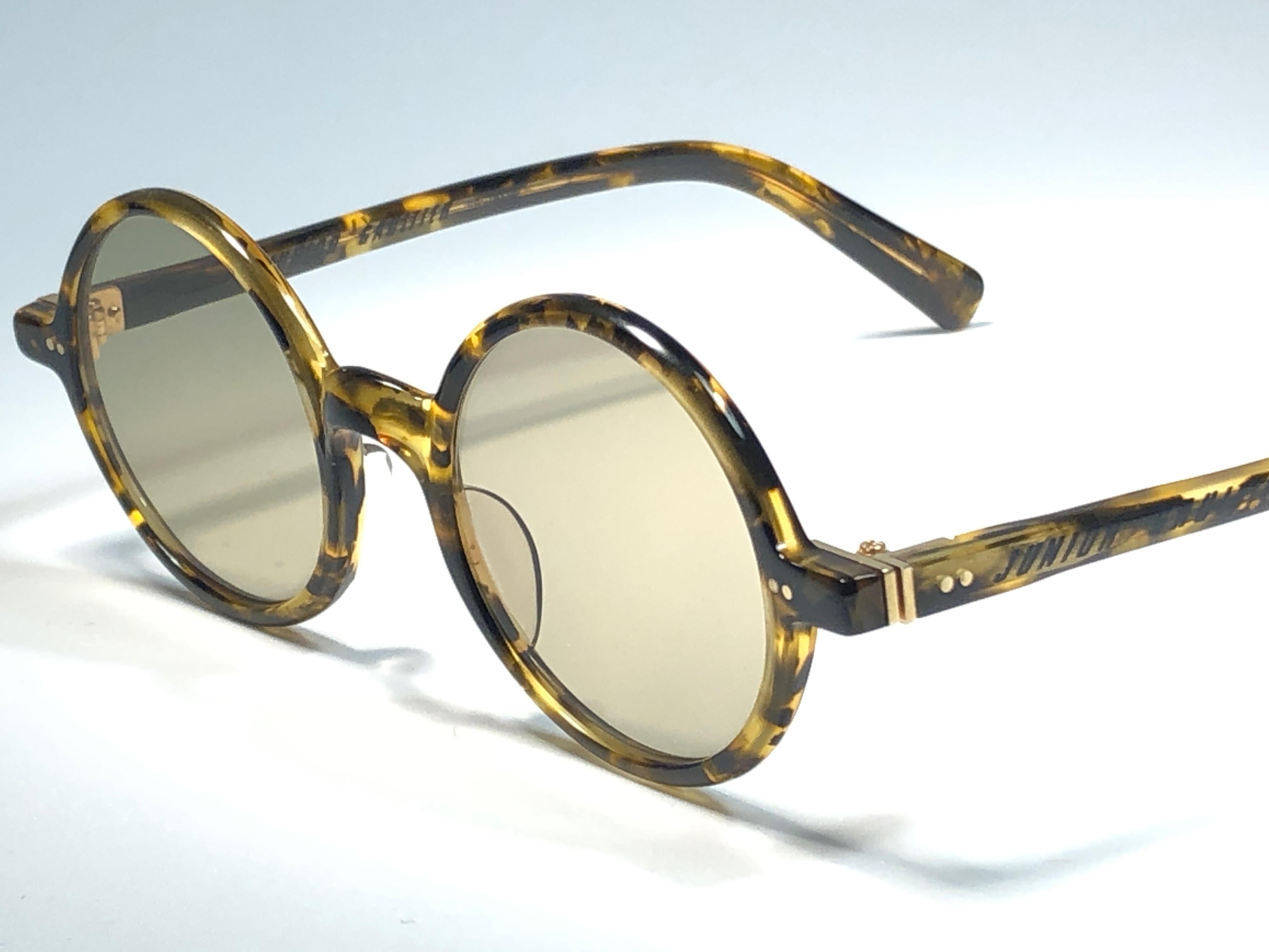 New Vintage Jean Paul Gaultier Junior 58 0072 XS Small frame in tortoise pattern.
Flat lenses for aa complete JPG look. 
The same model worn by Jean Reno in Luc Besson's, Leon The Professional.
Design and produced in the 1900's a timeless and iconic