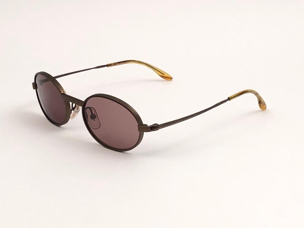 Superb and Hand Made pair of vintage Jil Sander sunglasses.    

Spotless medium brown lenses. 

New, never worn or displayed. Please notice this item its nearly 40 years old and may show minor sign of wear due to storage.

 Made in France.

Front 