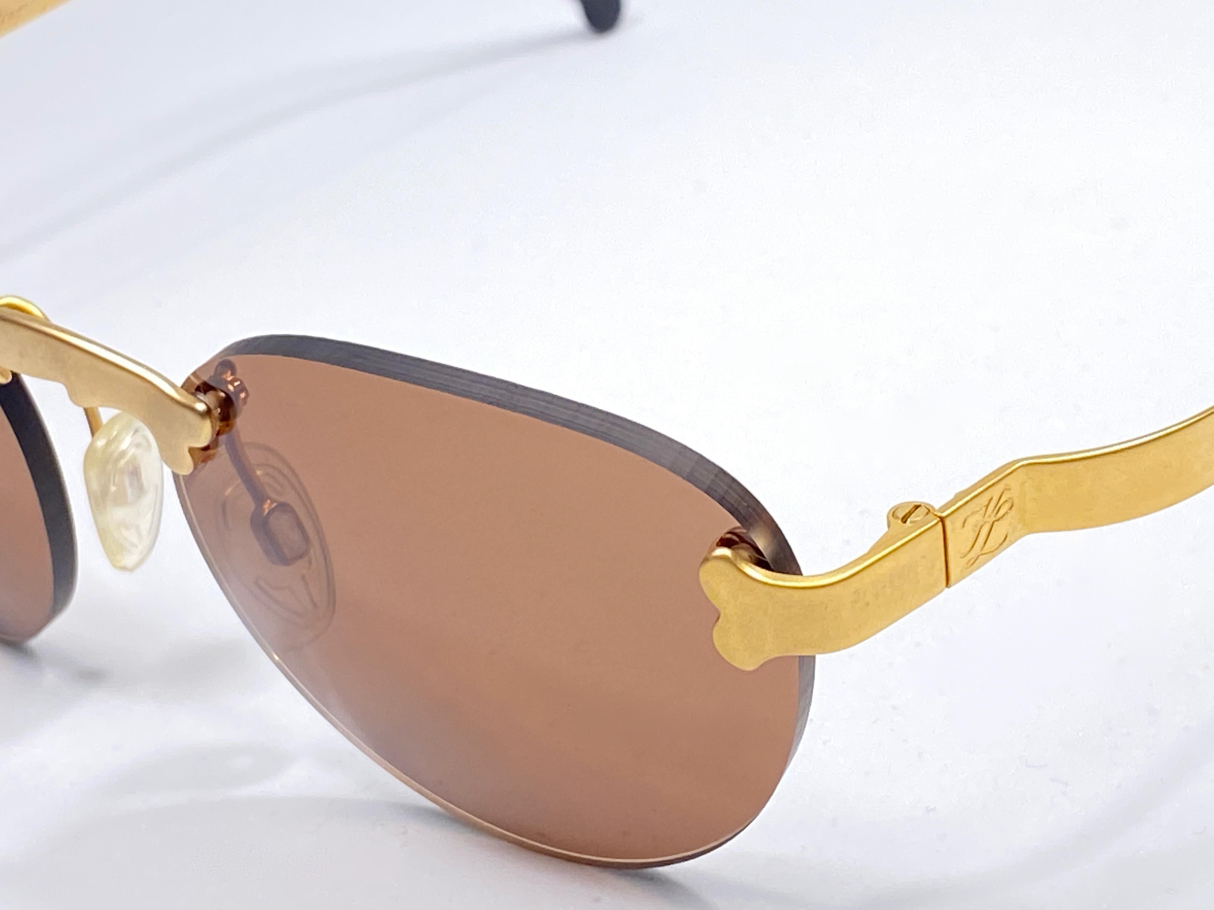 Women's New Vintage Karl Lagerfeld Rimless Gold Amber  80's Germany Sunglasses