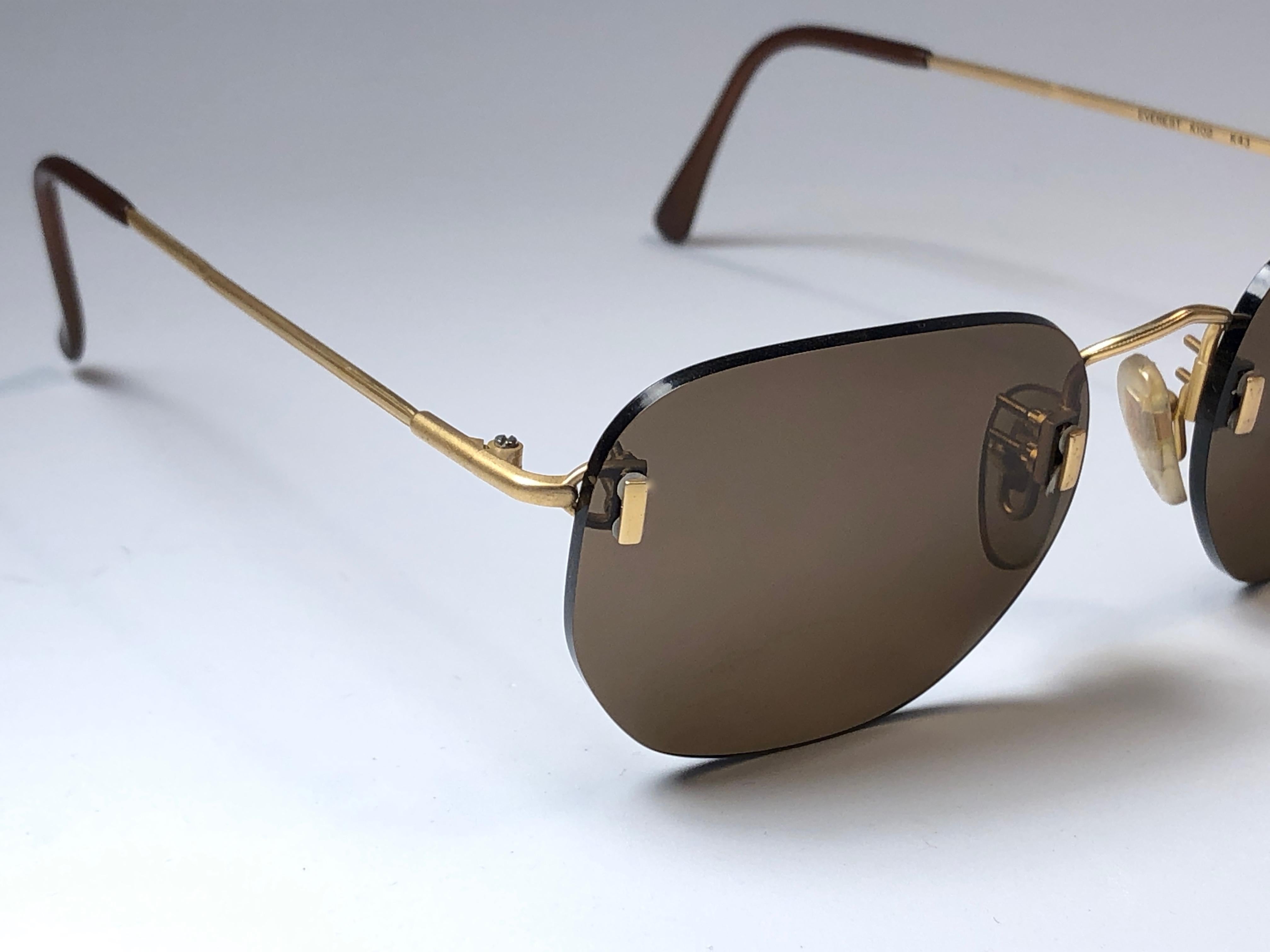 brown rimless sunglasses