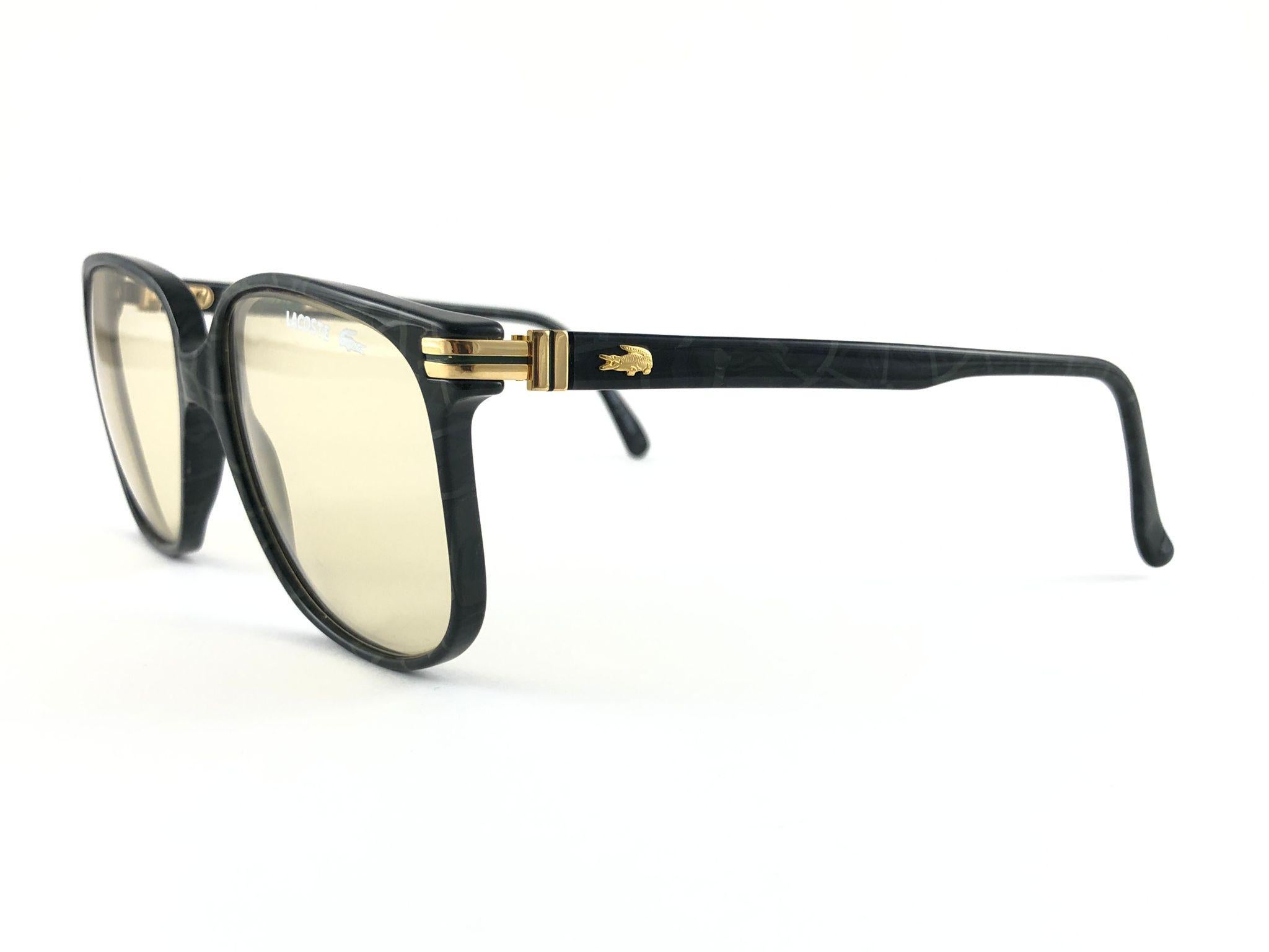 Sunglasses circa 1980's by Lacoste.

Please noticed this item its nearly 40 years old and has been on a private collection, therefore the frame show sign of wear according to age and minimum wear. 
Made in France.

MEASUREMENTS 

FRONT : 14 CMS
LENS