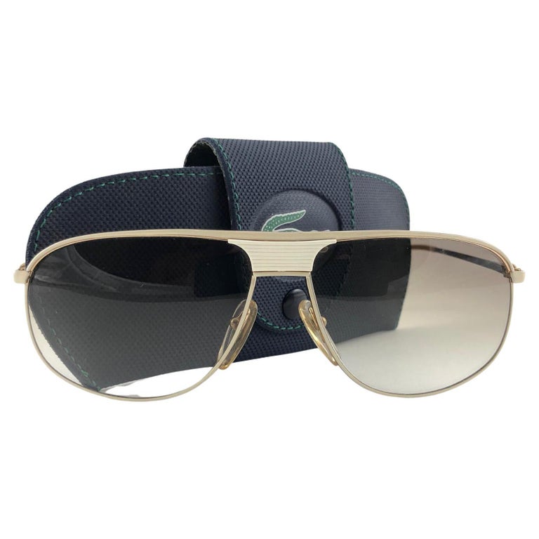 Neu Vintage Lacoste Sonnenbrille in Weiß 181 Beige mit Akzenten, 1980er  Jahre, hergestellt in Frankreich im Angebot bei 1stDibs