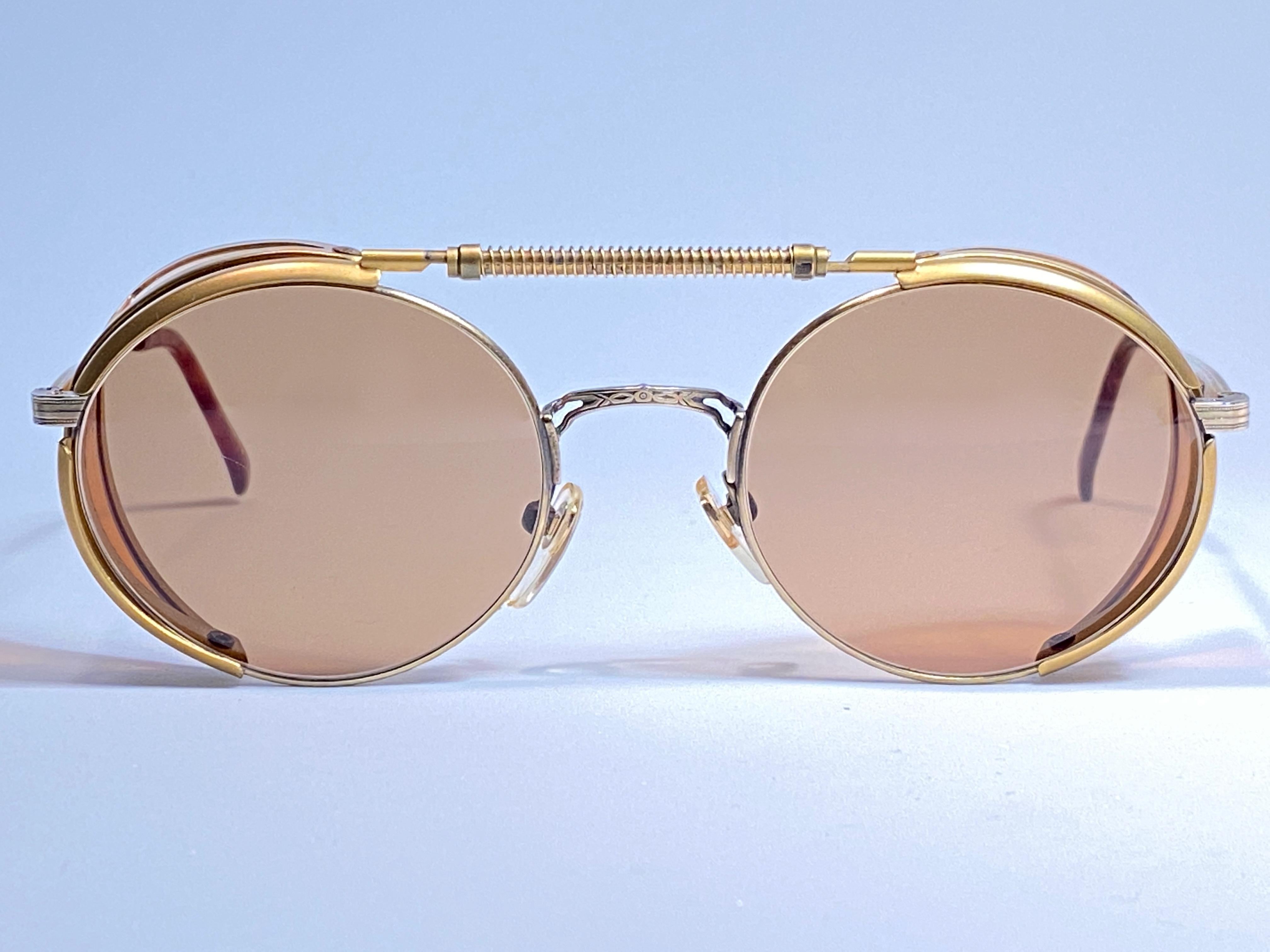Cult brand Matsuda signed this ultra rare piece. 

Removable side cups for an absolute new look. 
The very same model worn by Linda Hamilton as Sarah Connor in Terminator 2.

Superior quality and design. 

New, never worn or displayed. Made in