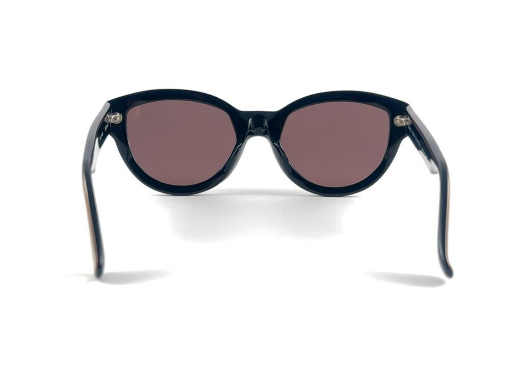 Nouvelles lunettes de soleil vintage Montana 520 à monture dorée et noire, fabriquées en France en vente 7