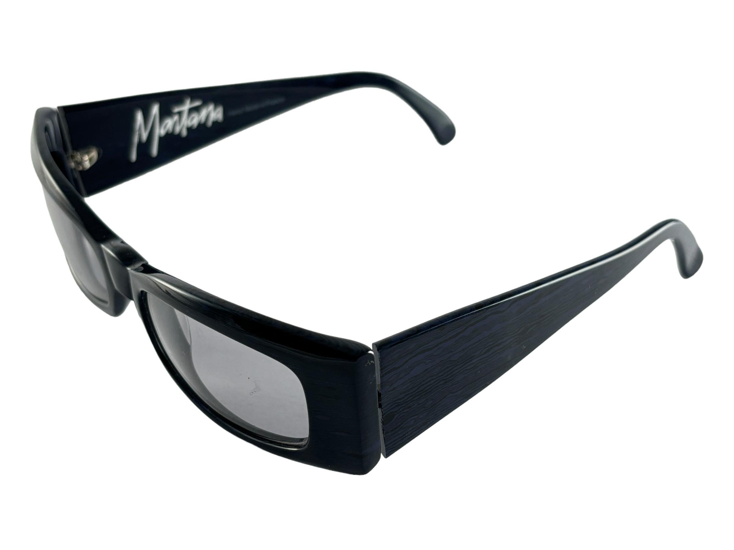New Vintage Montana By Alain Mikli  frame with light grey lenses.

Please consider that this item is nearly 40 years old so it could show minor sign of wear due to storage.  



Made in France.



Front                                     14.5
