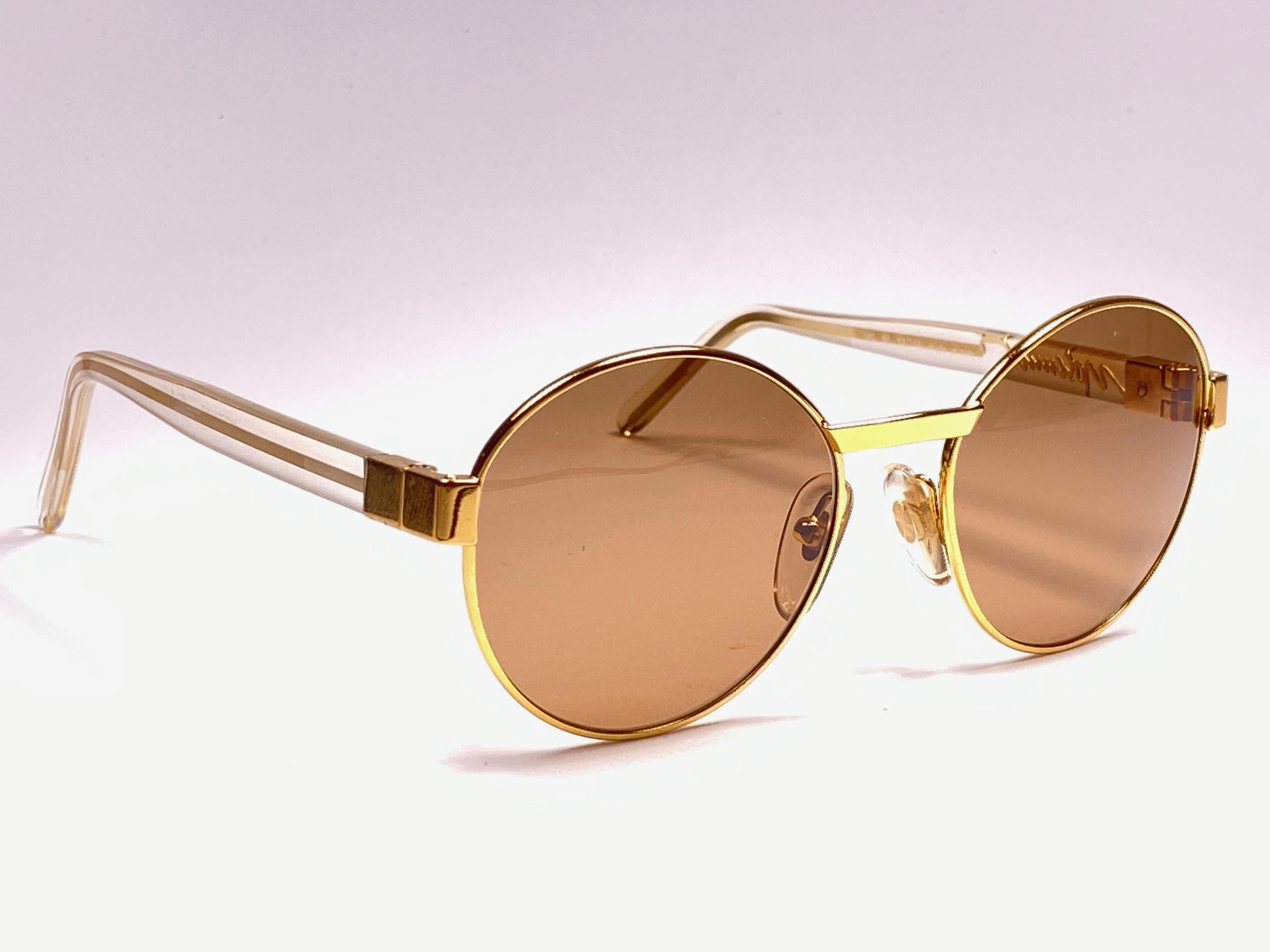 medium gold sunglasses