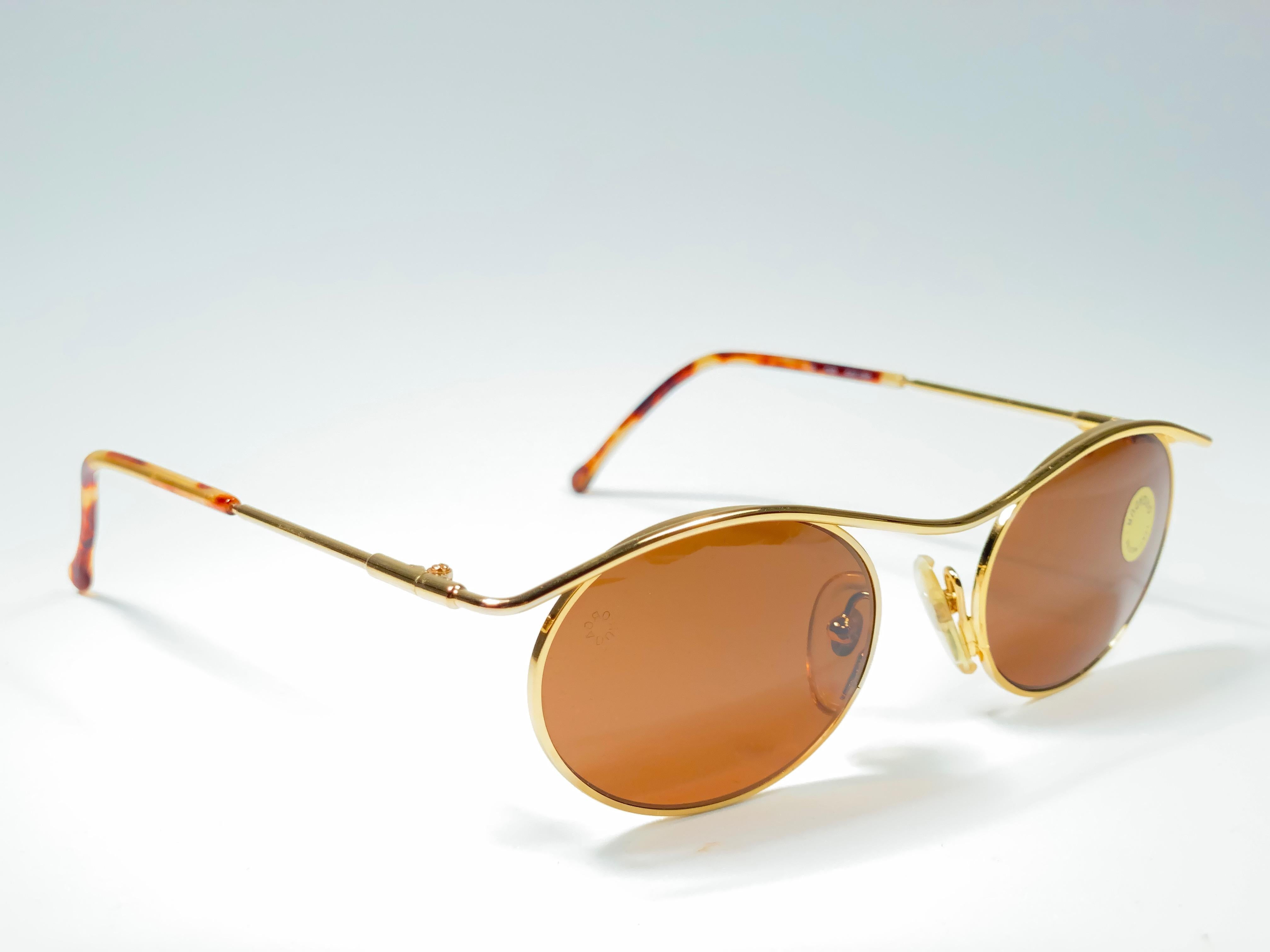 Marron Petites lunettes de soleil dorées Moschino MM276 