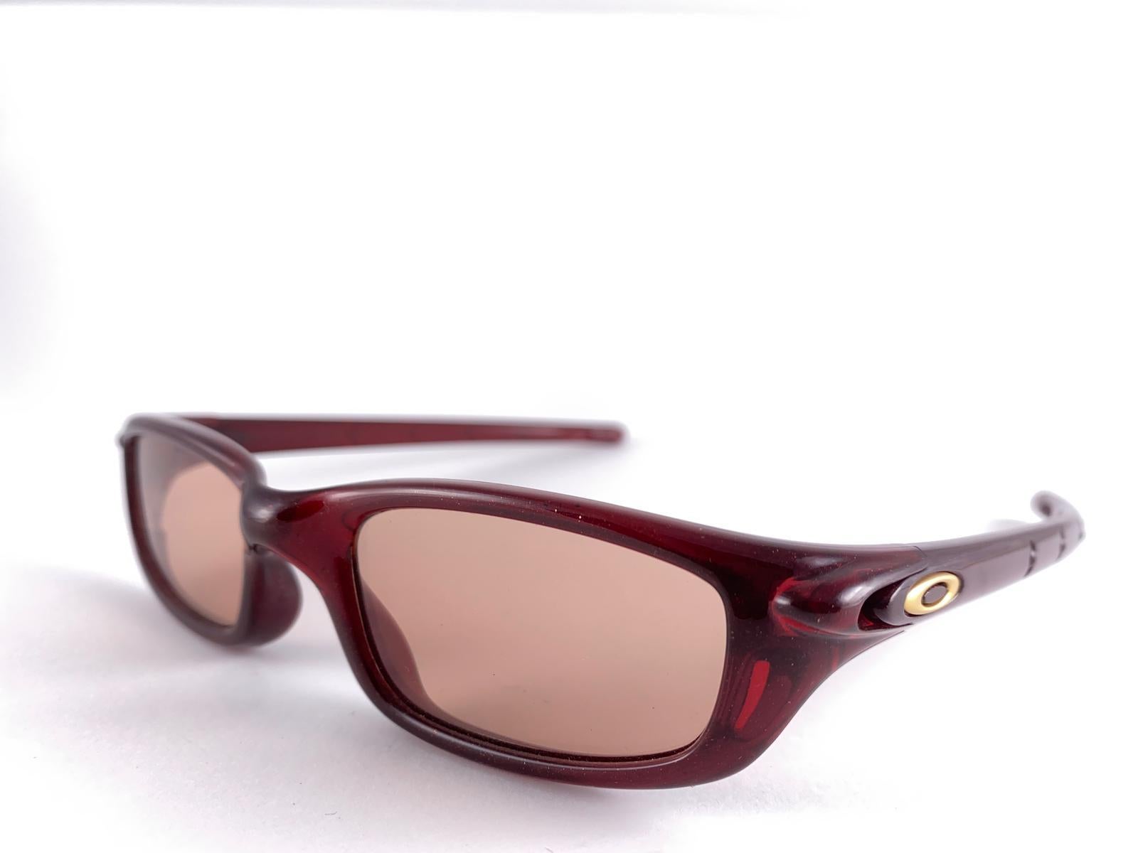 Women's or Men's New Vintage Oakley Burgundy Frame Rose Lens 2000's Sunglasses For Sale
