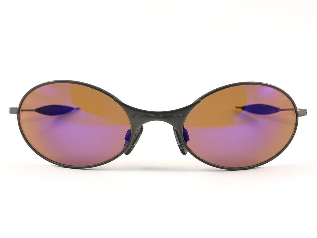  Oakley E Wire lunettes de soleil vintage neuves rouges et noires avec lentille en Iridium 2001  Unisexe 