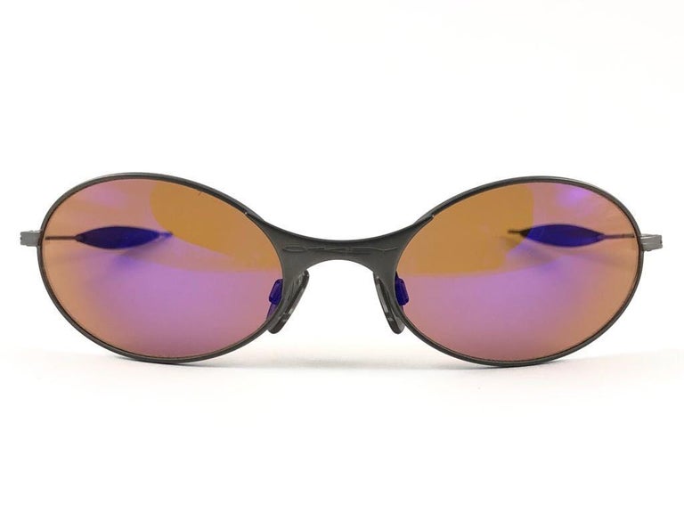 New Vintage Oakley E Wire Black Red Iridium Lens 2001 New Vintage Oakley E Wire Black Red Iridium Lens 2001