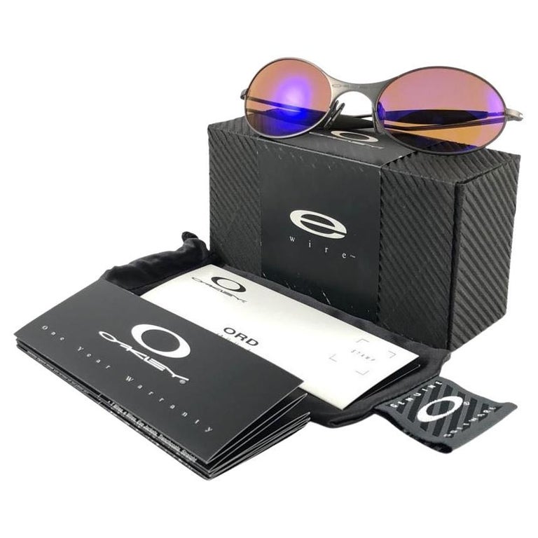 New Vintage Oakley E Wire Black Red Iridium Lens 2001 Sunglasses at 1stDibs