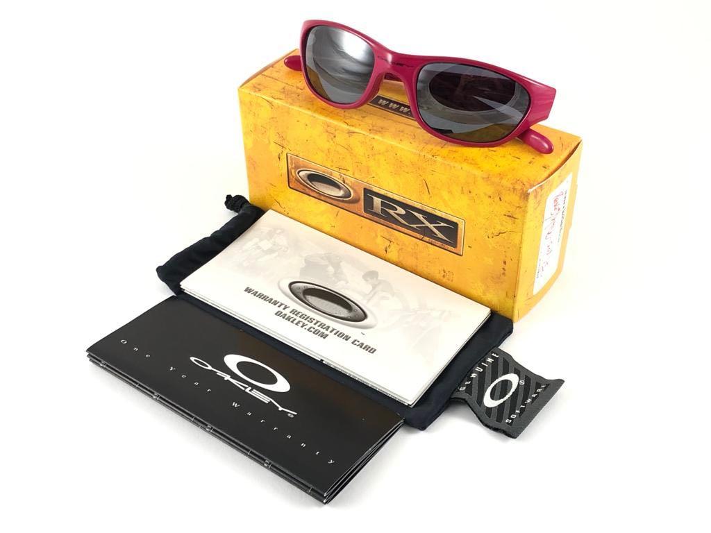 
New Vintage Oakley Fives 2.0 Sunglasses. Wrap raspberry textured sports frame with black iridium lenses.
New never worn or displayed. This item might show minor sign of wear due to storage.
Comes with its original box and papers as pictured.
Made