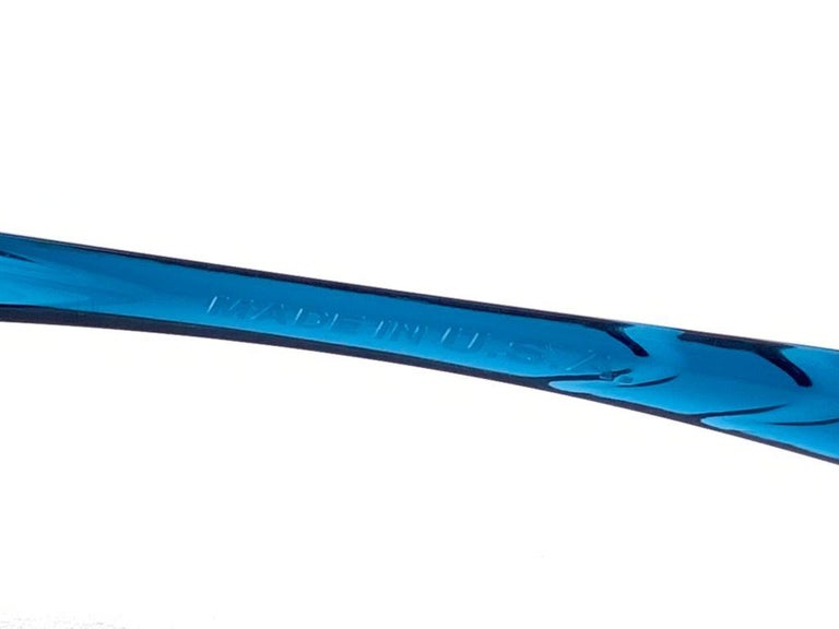 New Vintage Oakley Four Crystal Blue Gold Iridium Lenses