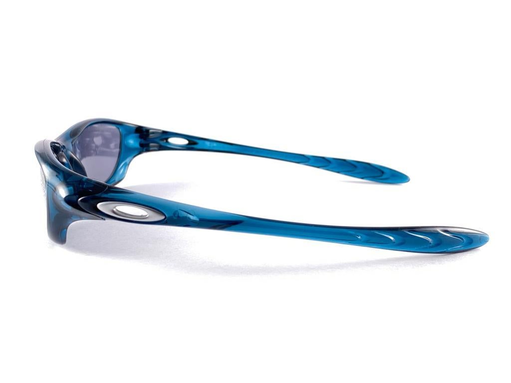 New Vintage Oakley Four Crystal Blue Gold Iridium Lenses 2000 Sunglasses For Sale 1
