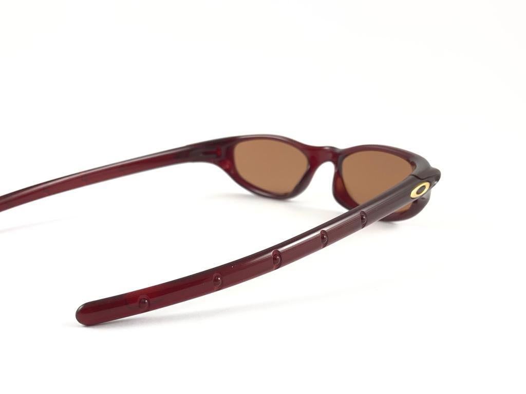 New Vintage Oakley Four Crystal Red 2000 Sunglasses In New Condition In Baleares, Baleares