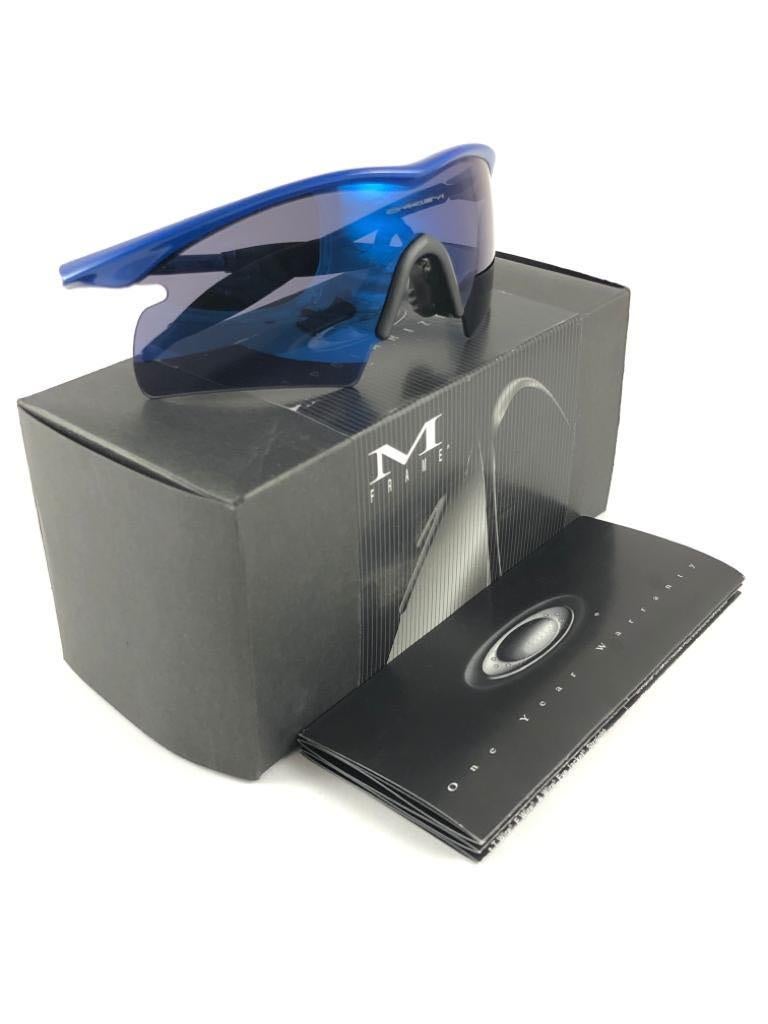 
New Vintage Oakley M Frame Sunglasses. Wrap blue sports frame with blue iridium lenses.
New never worn or displayed. This item might show minor sign of wear due to storage.
Comes with its original box and papers as pictured.
Made in Usa