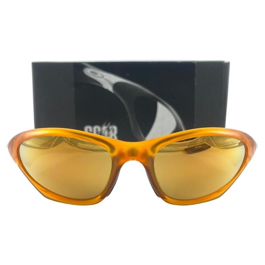 
New Vintage Oakley Scar Sunglasses. Wrap  sports frame with W24K lenses.
New never worn or displayed. This item might show minor sign of wear due to storage.
Comes with its original box and papers as pictured.
Made in Usa
