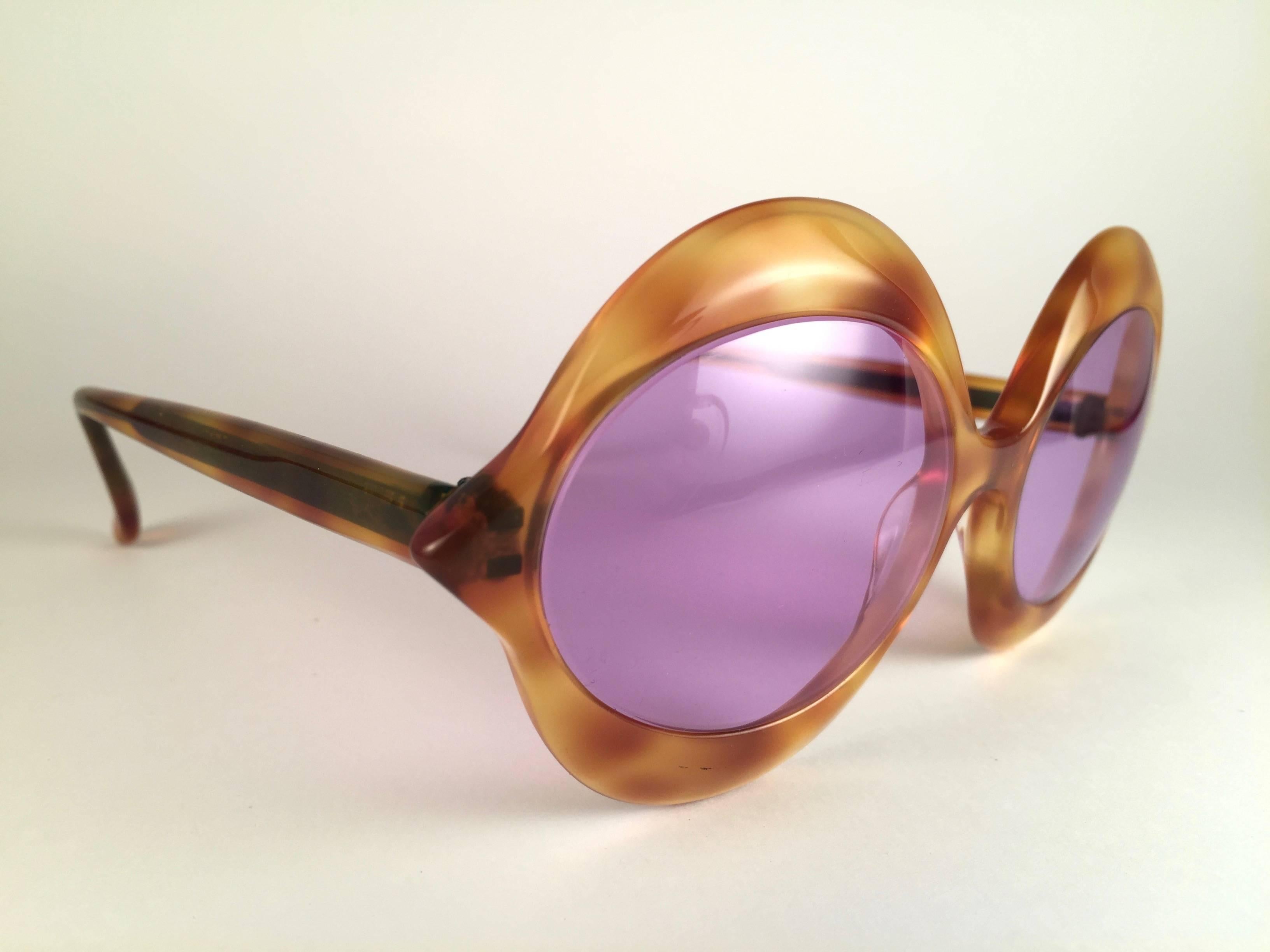 Vintage new Pierre Cardin lips c18 52/18 in light tortoise with spotless rose lenses Medium size 1960’s . Ultra rare design emulating a sleek and provocative pair of lips.  
New, never used or displayed this pair of vintage pierre cardin is a rare