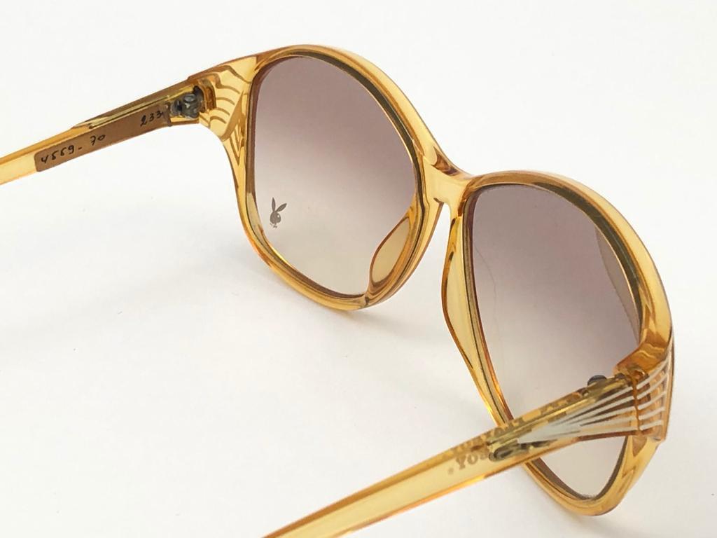 Donna Nuovo Playboy d'epoca 4559  Occhiali da sole traslucidi Optyl Amber Made in Austria