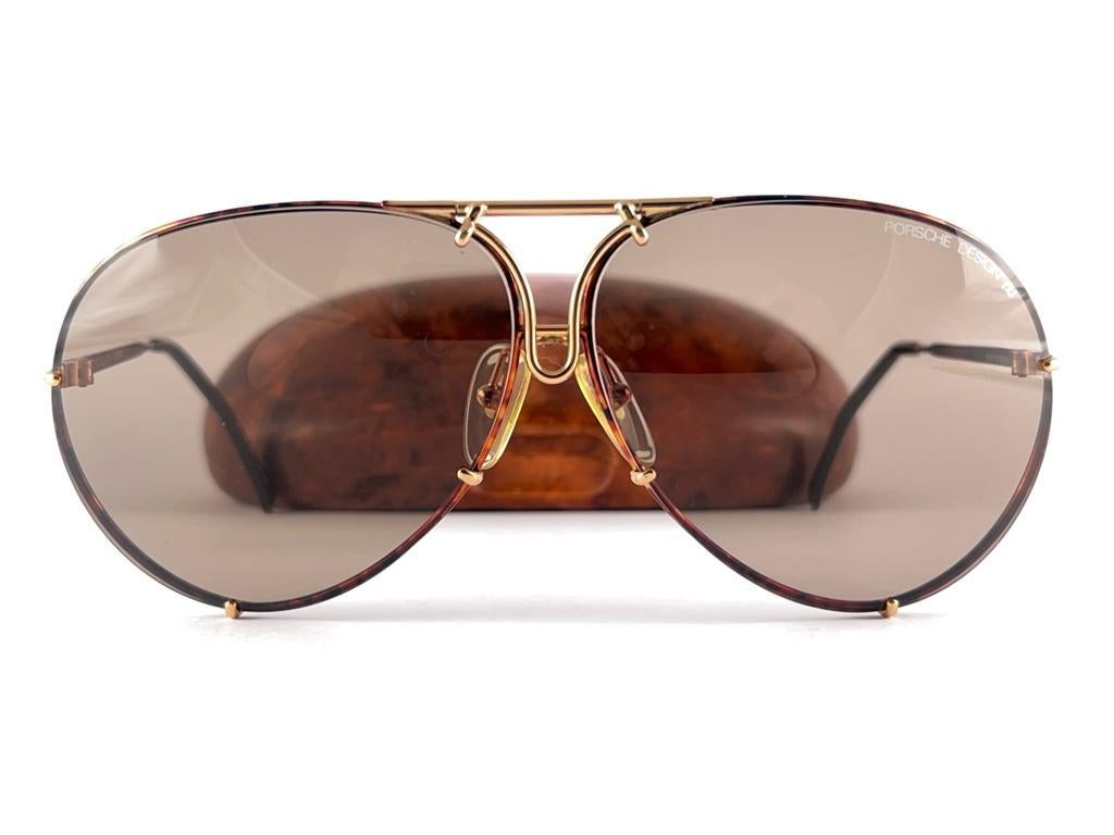 New and ultra rare collectors item from the 1980's, 30 years old. Porsche Design 5623 tortuga & gold frame with medium brown lenses. 
Amazing craftsmanship and quality.
Comes with the original Porsche hard case that has visible wear due to storage