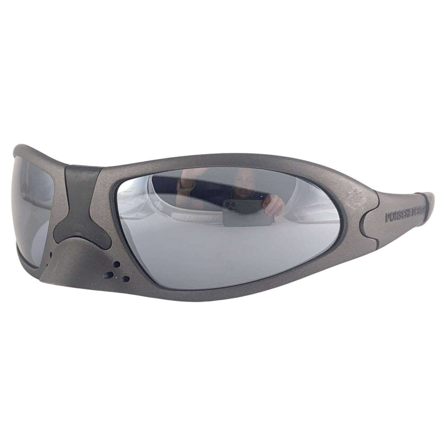 New And Ultra Rare Collectors Item From The 1990'S, 30 Years Old. Porsche Design rubberised nose guard design with silver mirrored lenses.
Amazing Craftsmanship And Quality.

New, Never Worn Or Displayed. This item show minor sign of wear on the