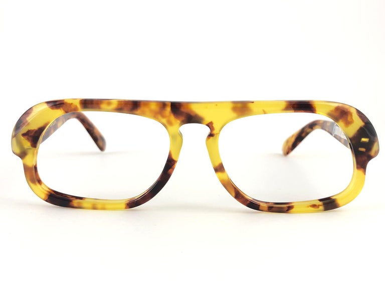 New vintage futuristic Pierre Cardin rectangular light tortoise frame perfect for any prescription lenses.
This pair have slight wear on them due to to nearly 60 years of storage.  
This vintage Pierre Cardin is a unique piece rarely seen up for
