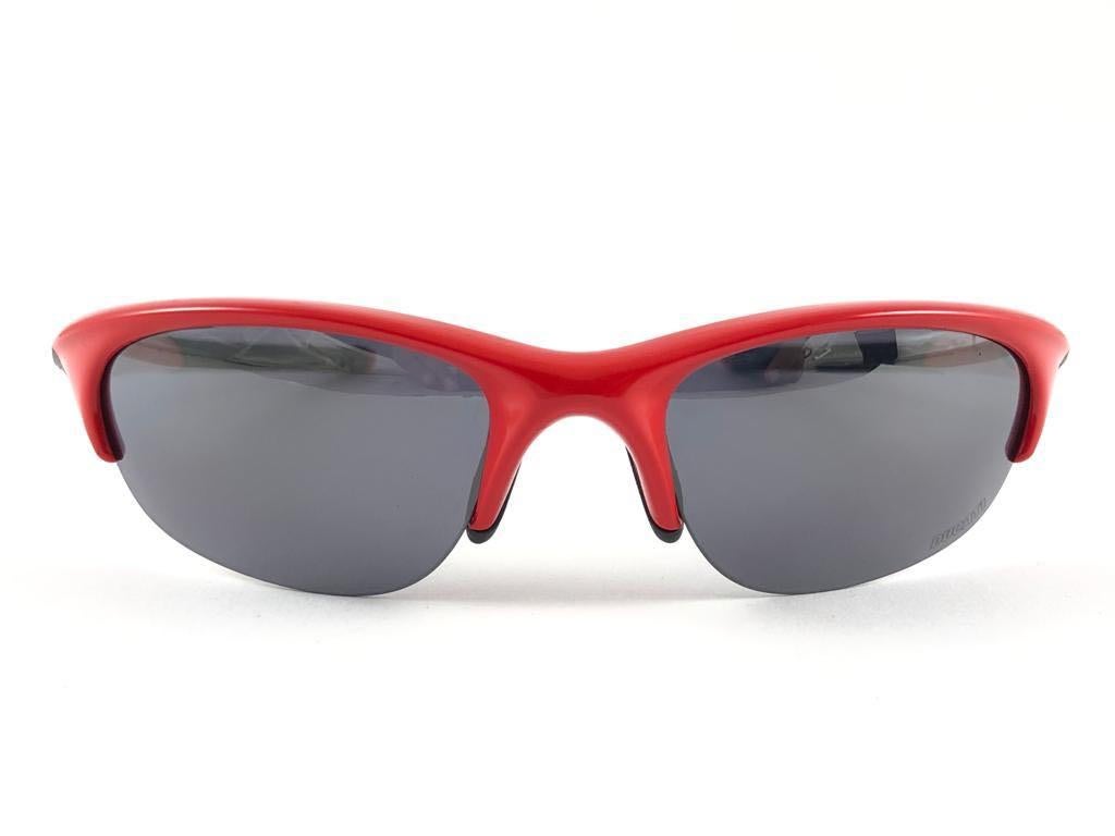
New Vintage are Oakley Sunglasses. Wrap red sports frame with black iridium lenses and set of interchangeable lenses.
New never worn or displayed. This item might show minor sign of wear due to storage.
Comes with its original box and papers as