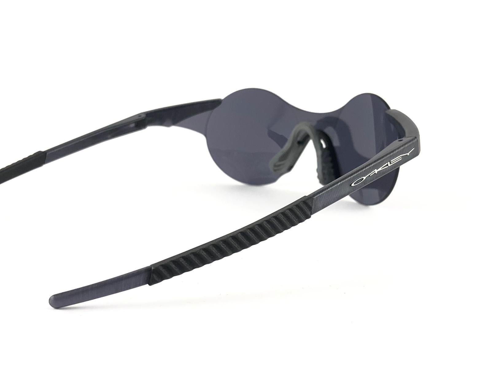 Gray New Vintage Rare Sports Oakley Wrap Around Grey Mirror Lens 1980's Sunglasses  For Sale