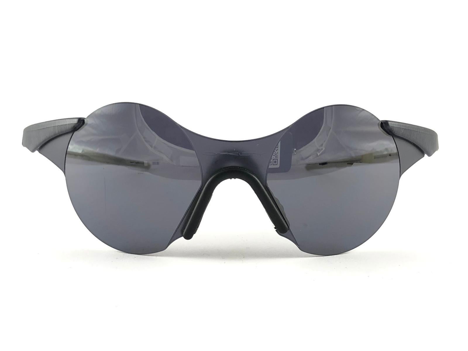 New Vintage Rare Sports Oakley Wrap Around Grey Mirror Lens 1980's  Sunglasses For Sale at 1stDibs