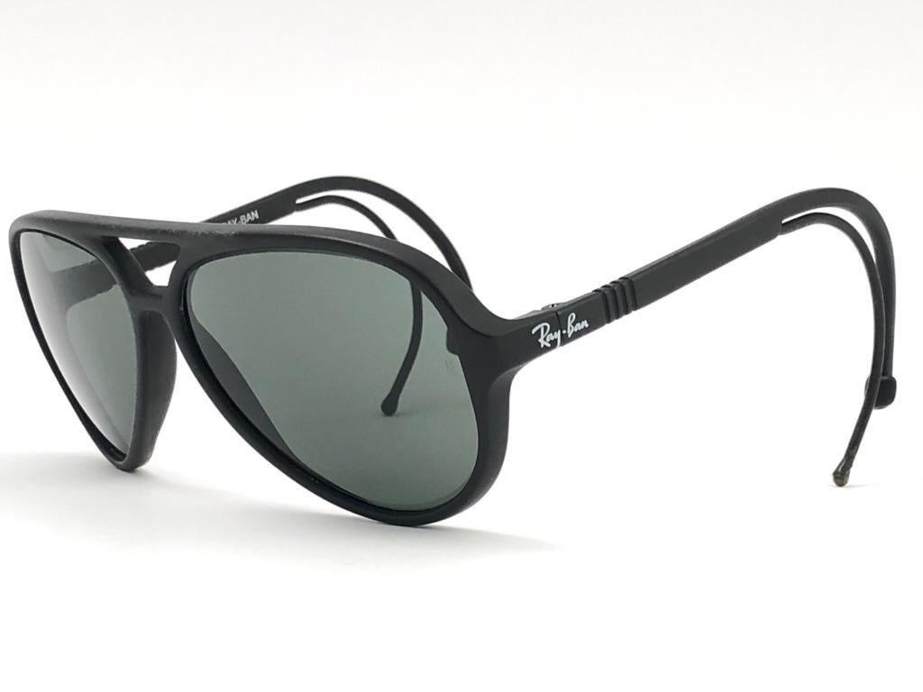 New and rare Vintage Ray Ban Sport Series 4 black matte frame with G15 grey lenses. Curled earpieces.
New, never worn or displayed.  This pair may have minor sign of wear due to nearly 40 years of storage. Designed and Produced in USA.

FRONT : 14.5