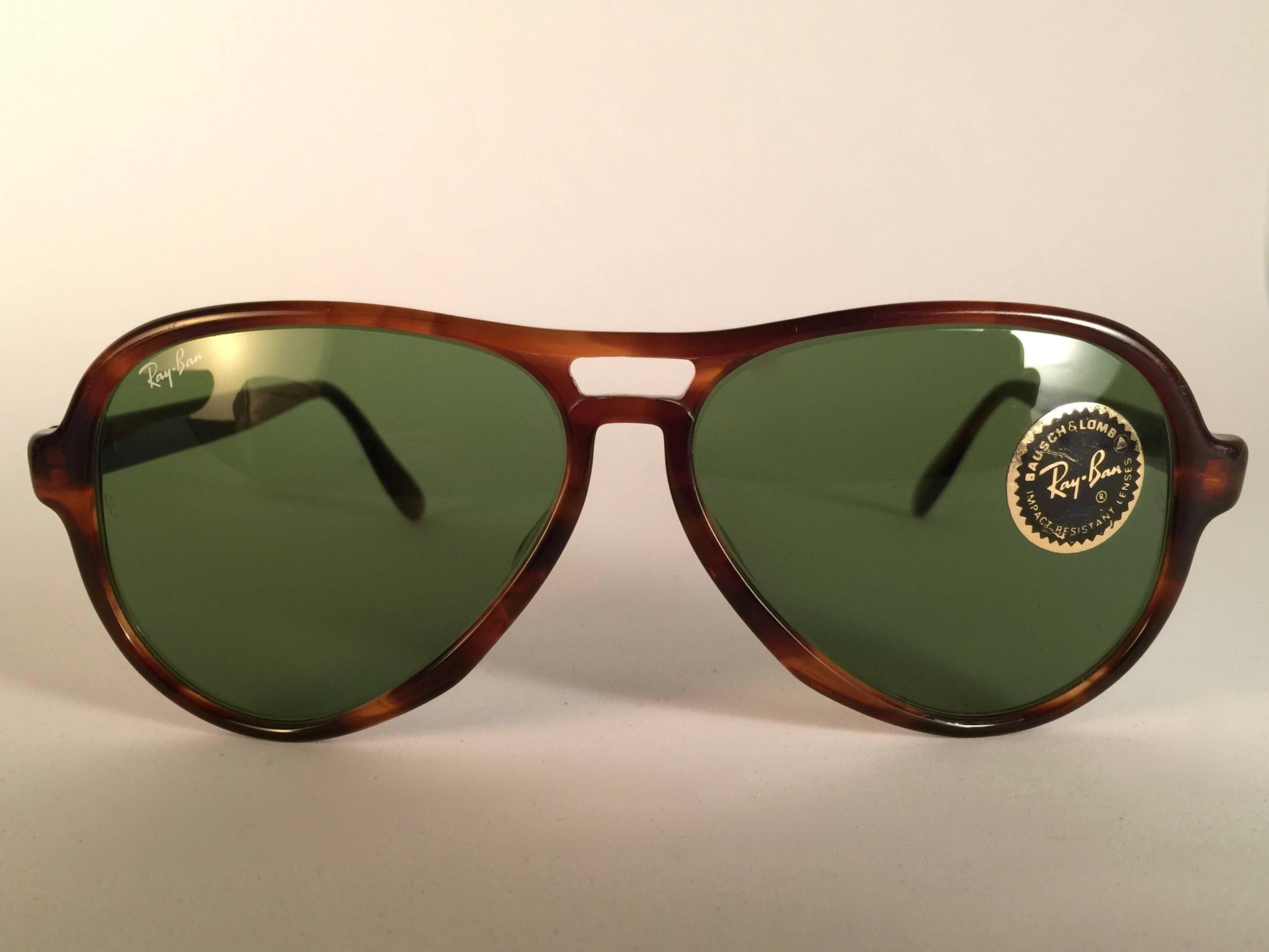 Mint and rare vintage Vagabond tortoise frame holding a spotless pair of G15 grey lenses.  
Mint, never worn or displayed.  This pair may have visible sign of wear due to nearly 40 years of storage. Designed and Produced in USA.
