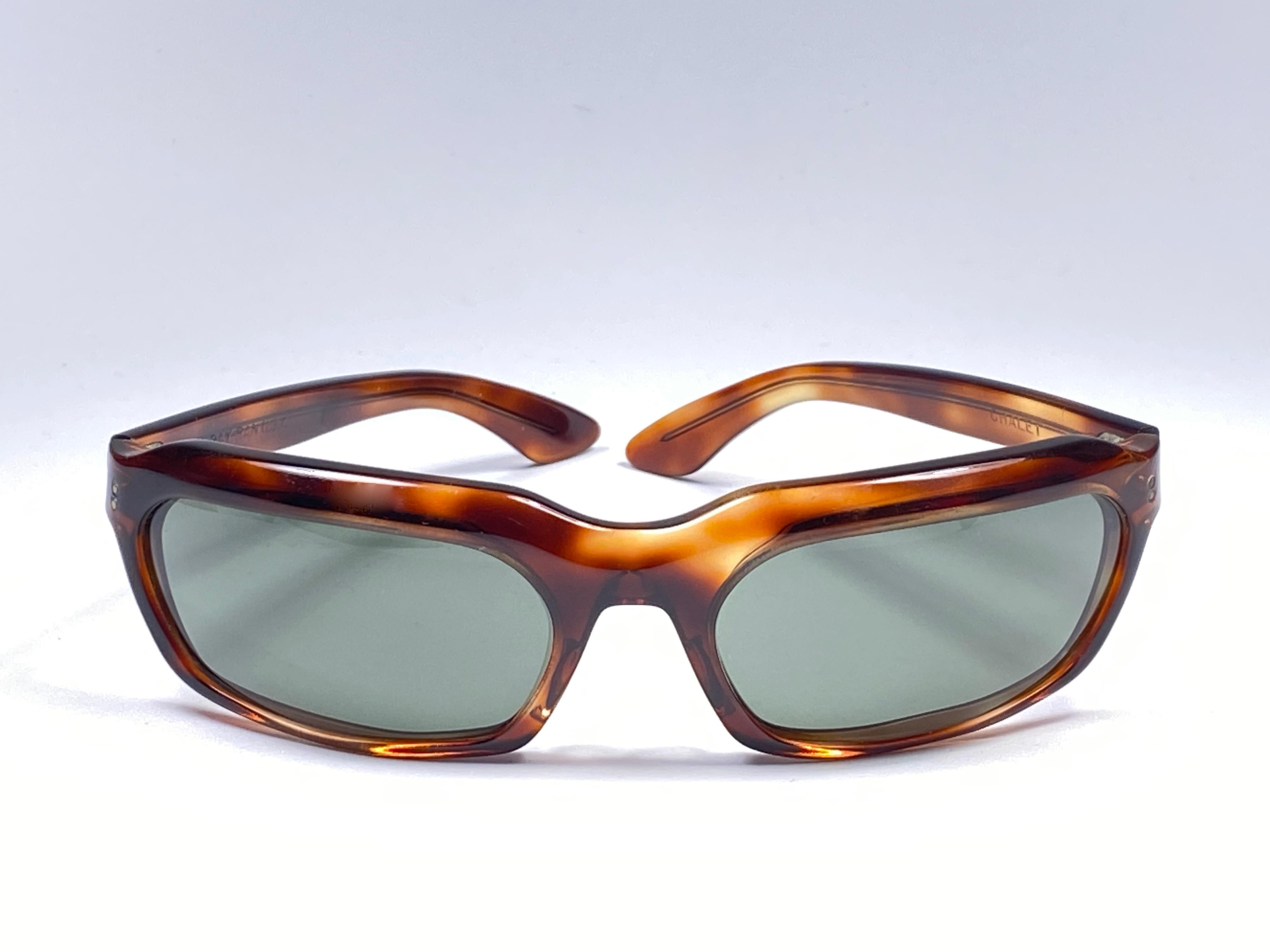 Rare 1960's Chalet dark tortoise. 
Bausch and Lomb USA Made. G15 grey lenses no Ray Ban logo or B&L etched . Straight out of the 1960's. All hallmarks.  Minor sign of wear on  lenses and frame due to 60 years of storage. 
A Piece of sunglasses