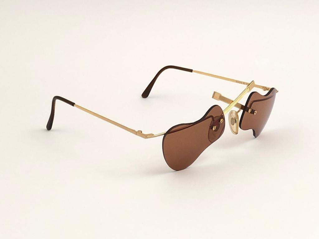 Women's or Men's New Vintage Rimless Gold Infinity Guitars 1990 Sunglasses For Sale
