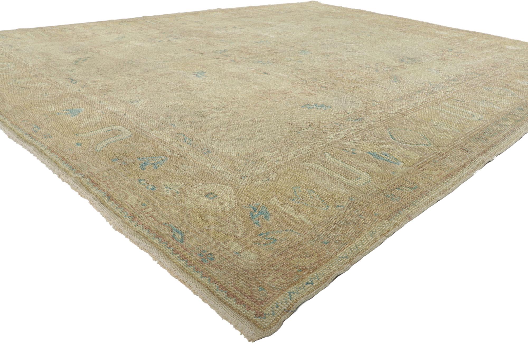 51629 New Turkish Oushak Rug, 08’07 x 10’04. 
Emanating vintage charm with incredible detail and texture, this hand knotted wool Turkish Oushak rug is a captivating vision of woven beauty. The intricate botanical design and soft earth-tone colors