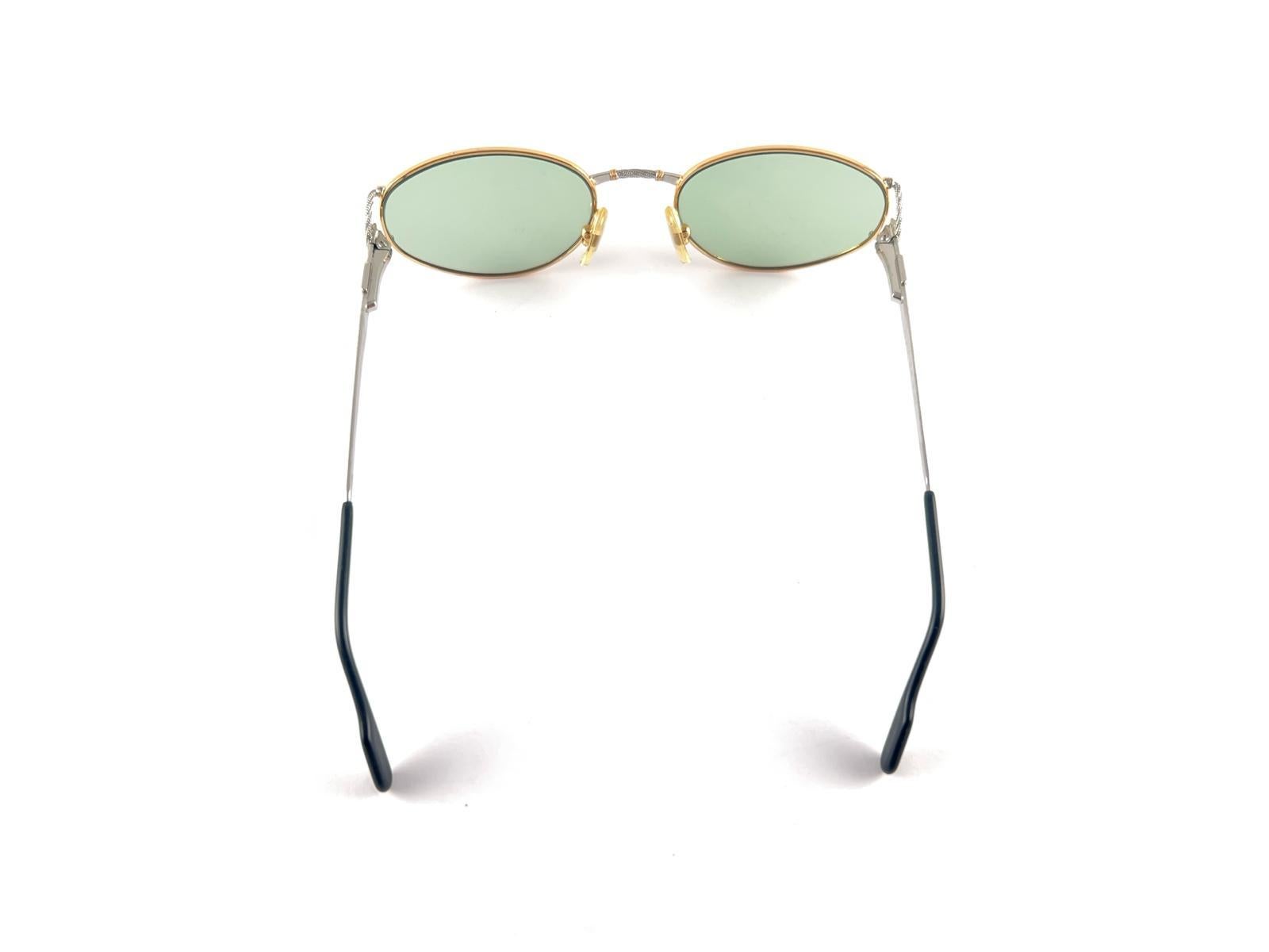 Nuevas gafas de sol vintage Tiffany T 387 ovaladas chapadas en oro con lentes verdes años 90 Italia en venta 6