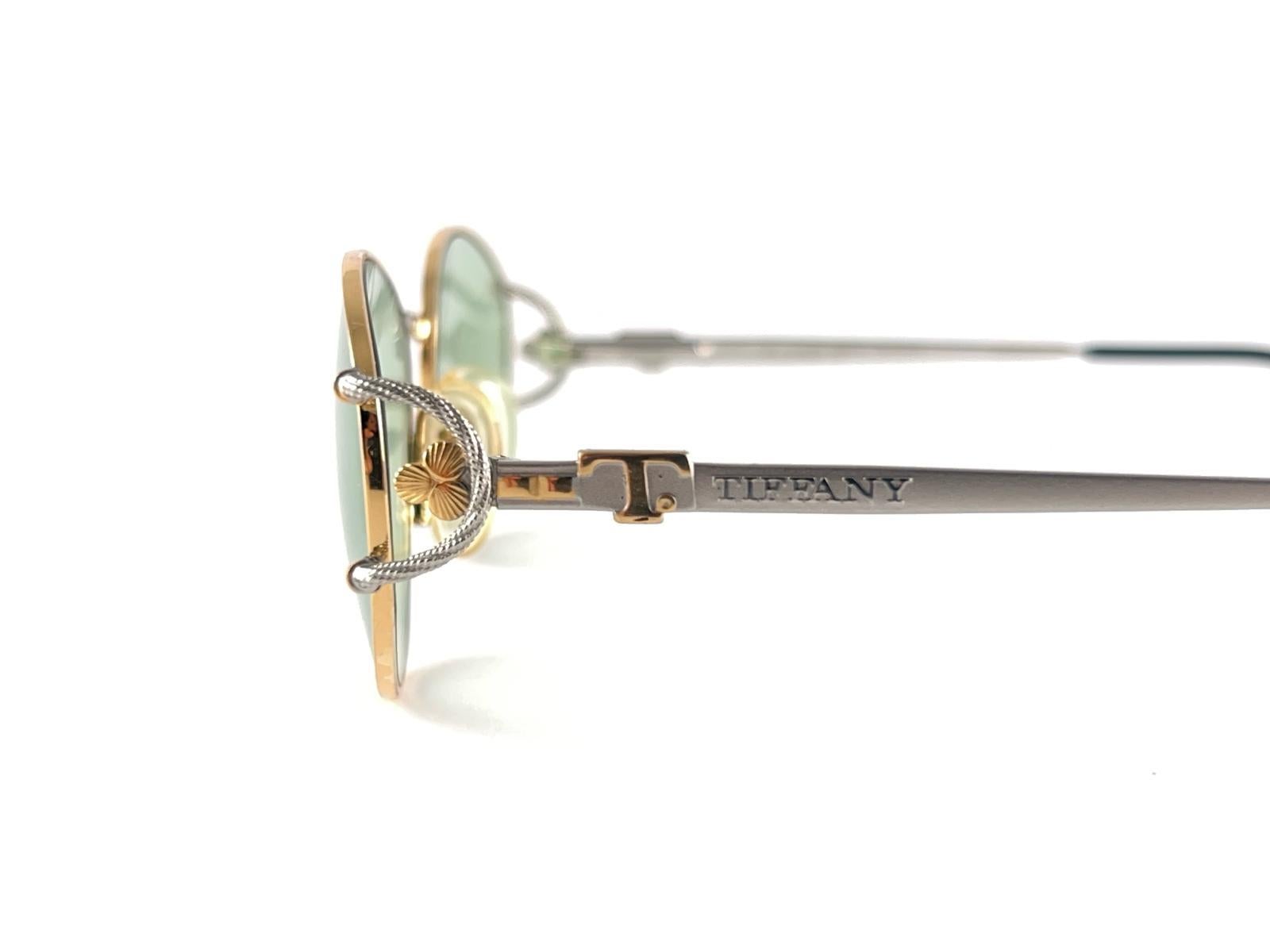 Nuevas gafas de sol vintage Tiffany T 387 ovaladas chapadas en oro con lentes verdes años 90 Italia en venta 1