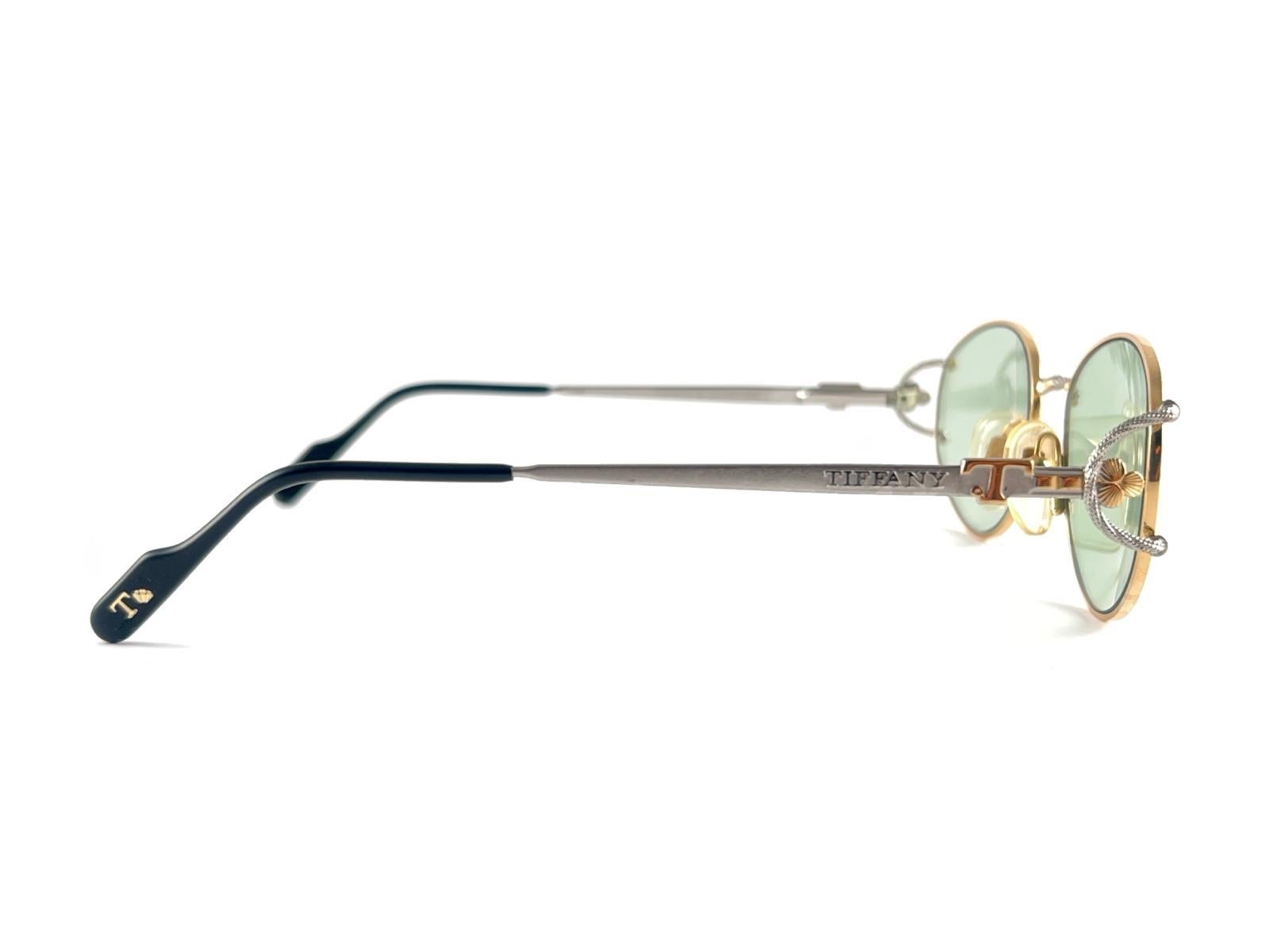 Nuevas gafas de sol vintage Tiffany T 387 ovaladas chapadas en oro con lentes verdes años 90 Italia en venta 2
