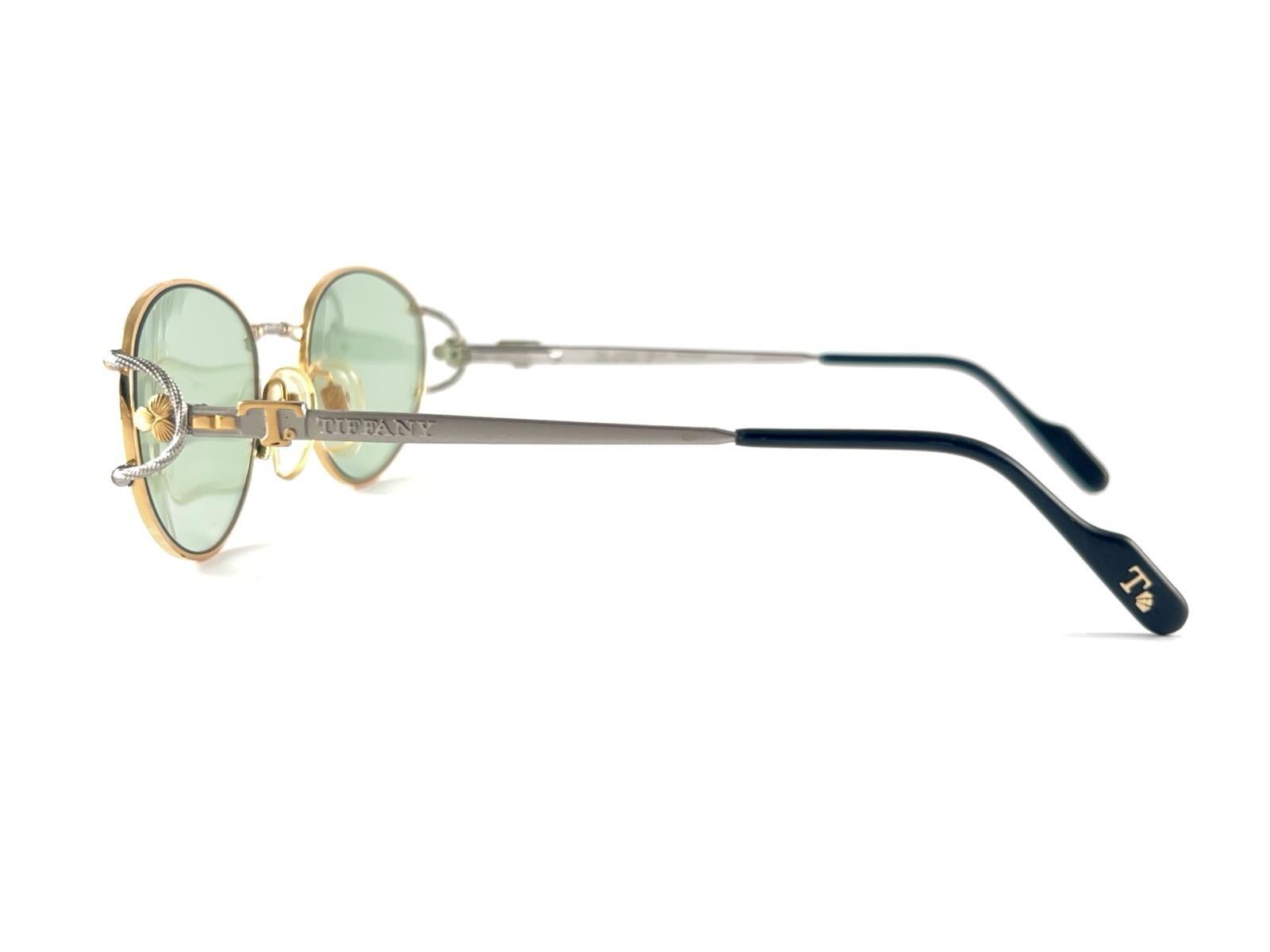 Nuevas gafas de sol vintage Tiffany T 387 ovaladas chapadas en oro con lentes verdes años 90 Italia en venta 3