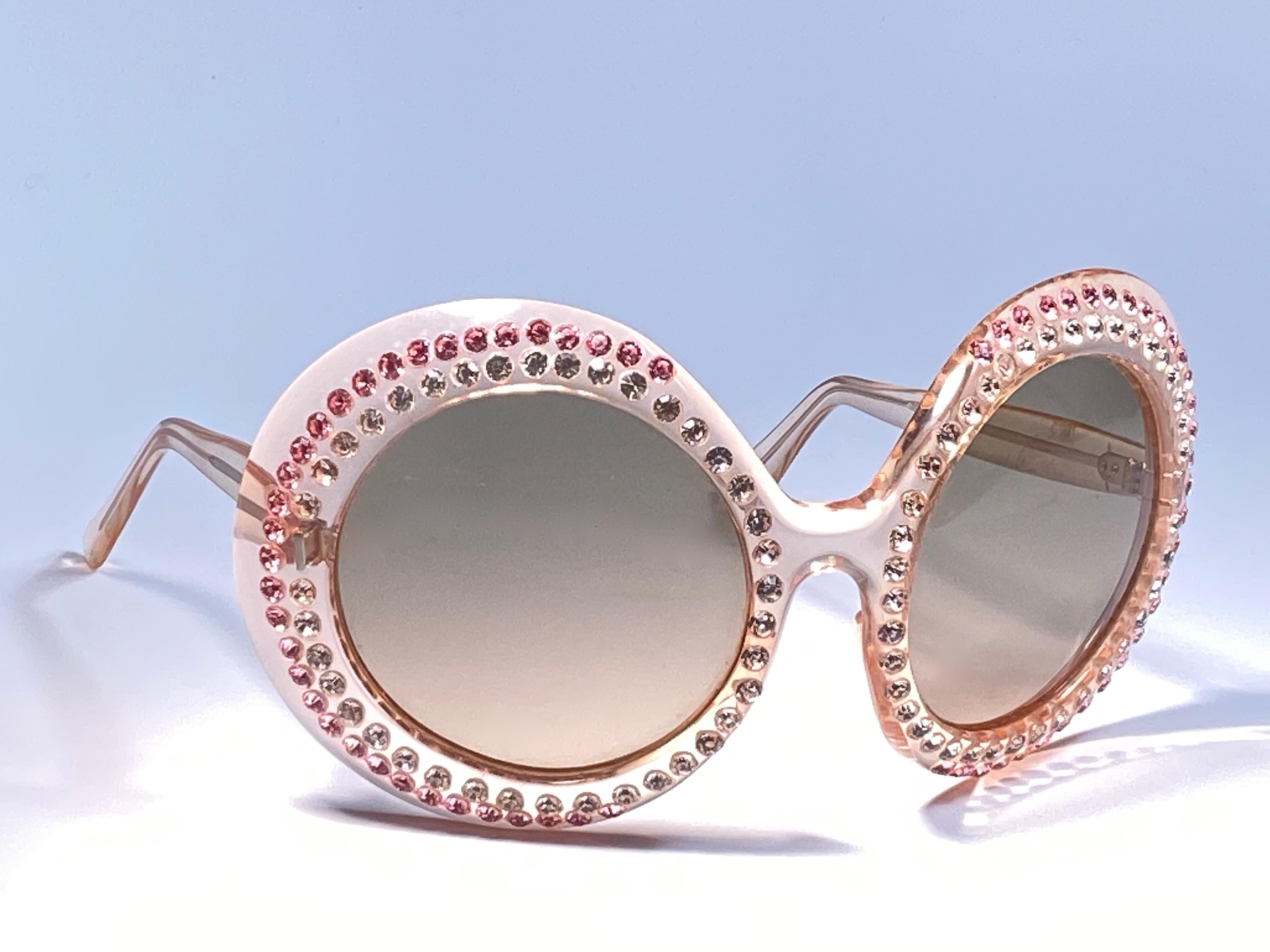 Vintage Victor France Oversized rhinestoned frame sporting a pair of medium brown lenses. 
Designed and produced in the 1960’s. 

This pair of vintage Victor is a collectors must have. 
From the same series used by Elton John in Pinball Wizard.
A