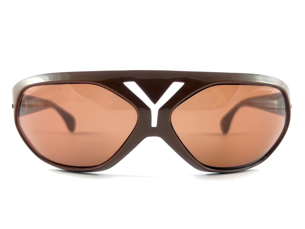 
Beautiful and stylish vintage Yves Saint Laurent 1980’s bug eyed mocha sunglasses.
Spotless pair of medium brown lenses. 
New! never worn or displayed. Flawless pair!!!   
This pair could show minor sign of wear due to storage. 
A great opportunity